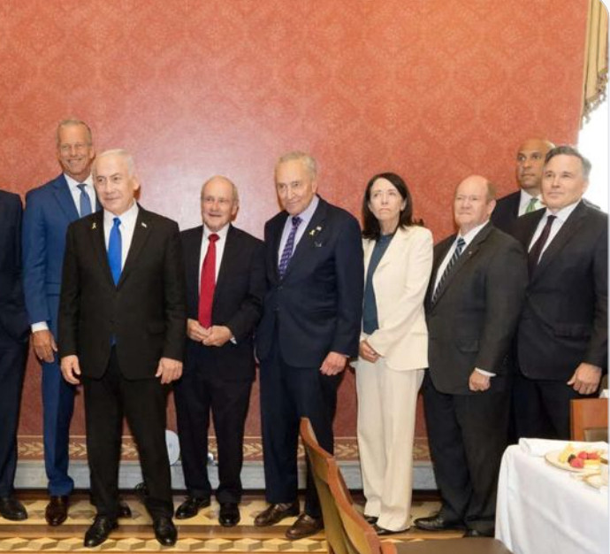 corey booker far right, staring himself into nothingness near Netanyahu
