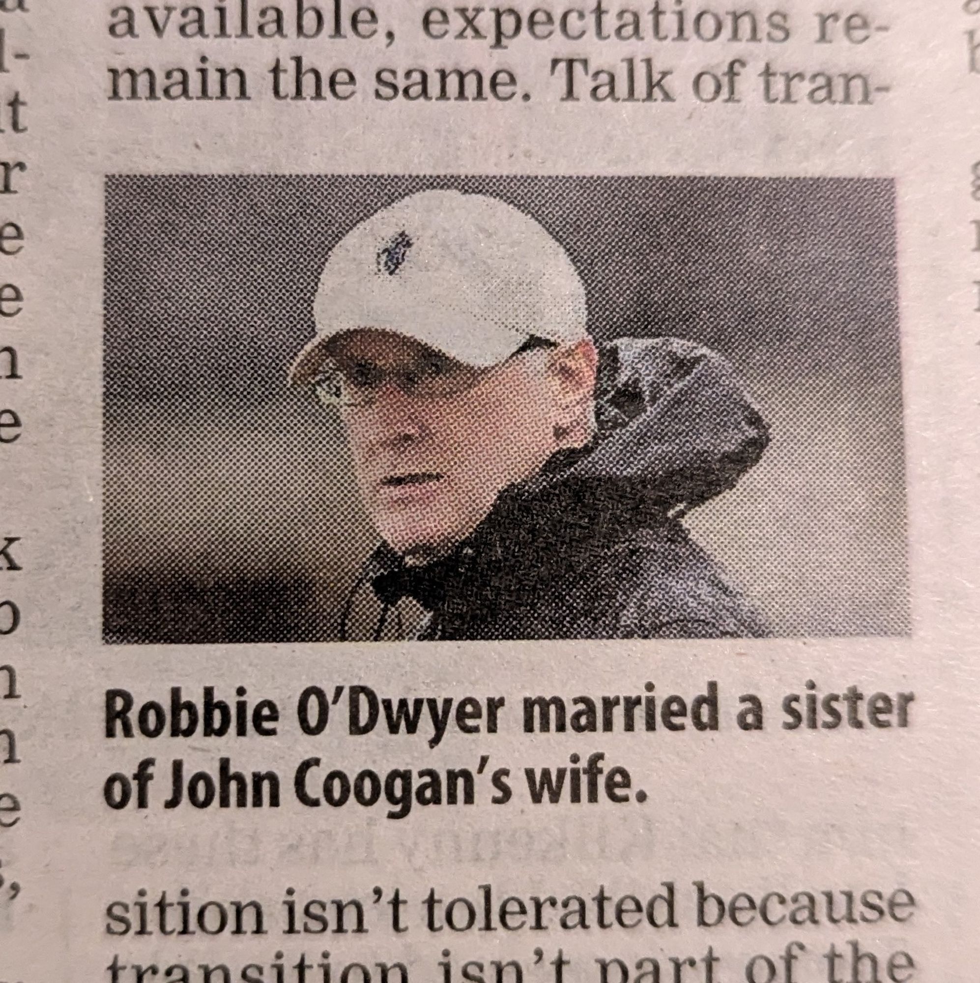 Photograph of a middle-aged white man with glasses and a white baseball cap. The caption underneath the photo reads, 'Robbie O'Dwyer married a sister of John Coogan's wife'.