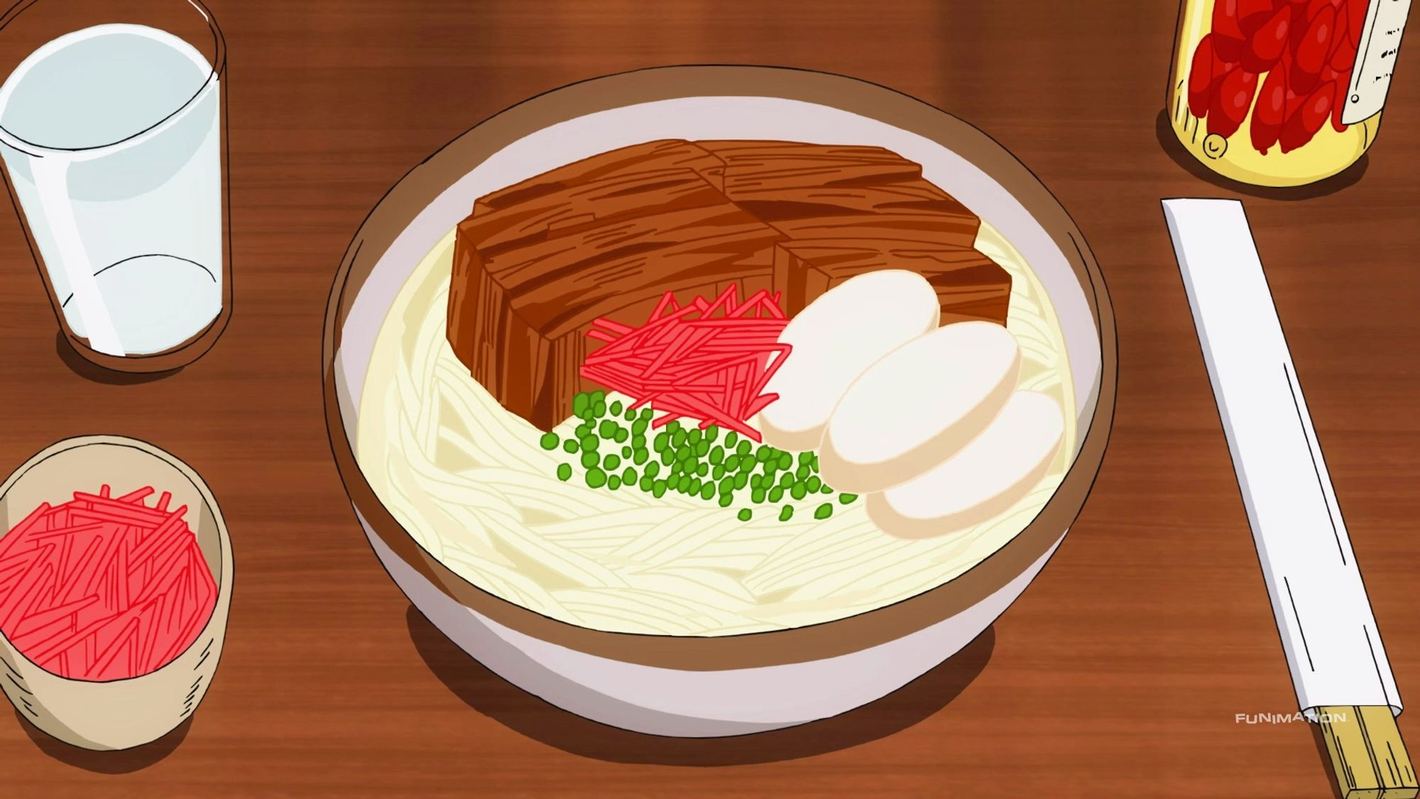 Anime screencap from The Disastrous Life of Saiki K: A bowl of soba topped with pork belly, fish cakes, pickled ginger, and green onions.