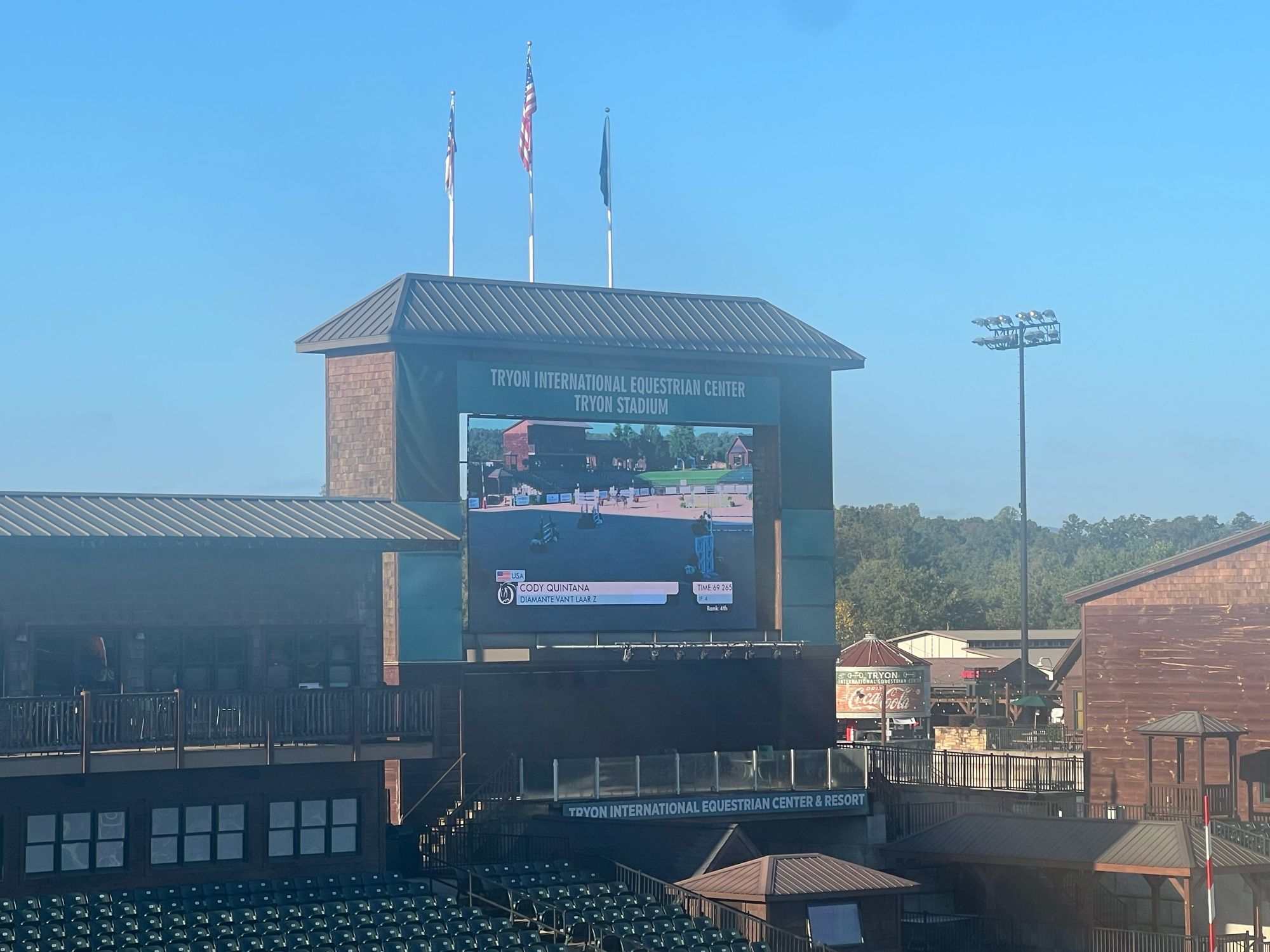 Photo of a Jumbotron with equestrian riders at the Tryon International Equestrian Center