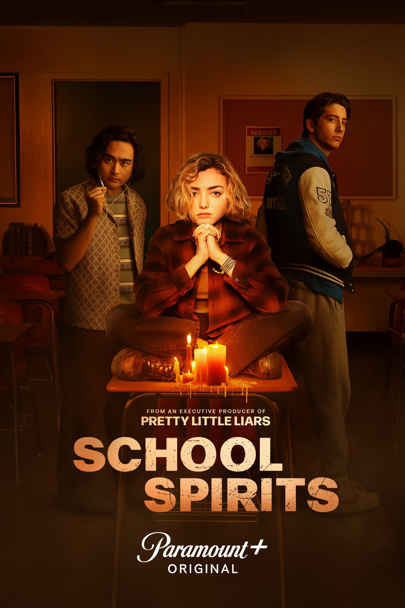 A poster for Paramount+ Original and Netflix loan show School Spirits, with Kristian Ventura and Milo Manheim on either side of absolute smokeshow Peyton List. The younger actress with that name. Fun fact, they both voiced women in Batman: Hush, with this List as Barbara Gordon and the older as Poison Ivy.