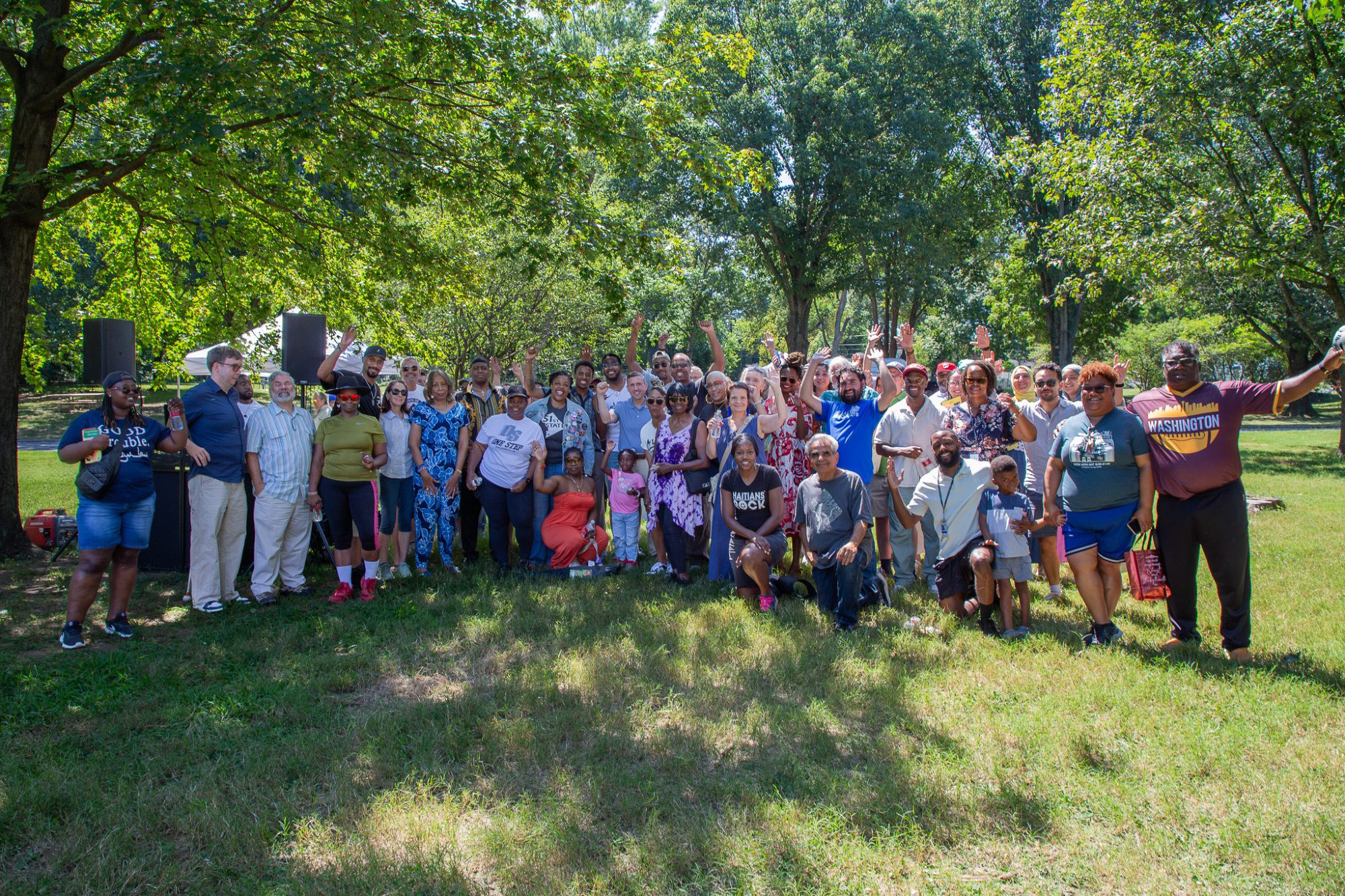 Group of people posing together outside at the Capital Cookout in Ward 7 in Washington, D.C. 