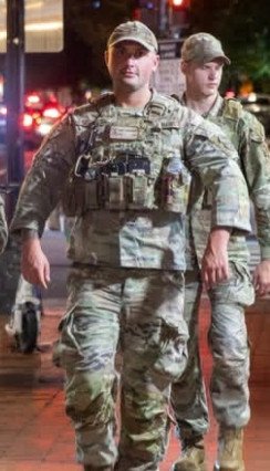 a national guardsman walking perfectly normally