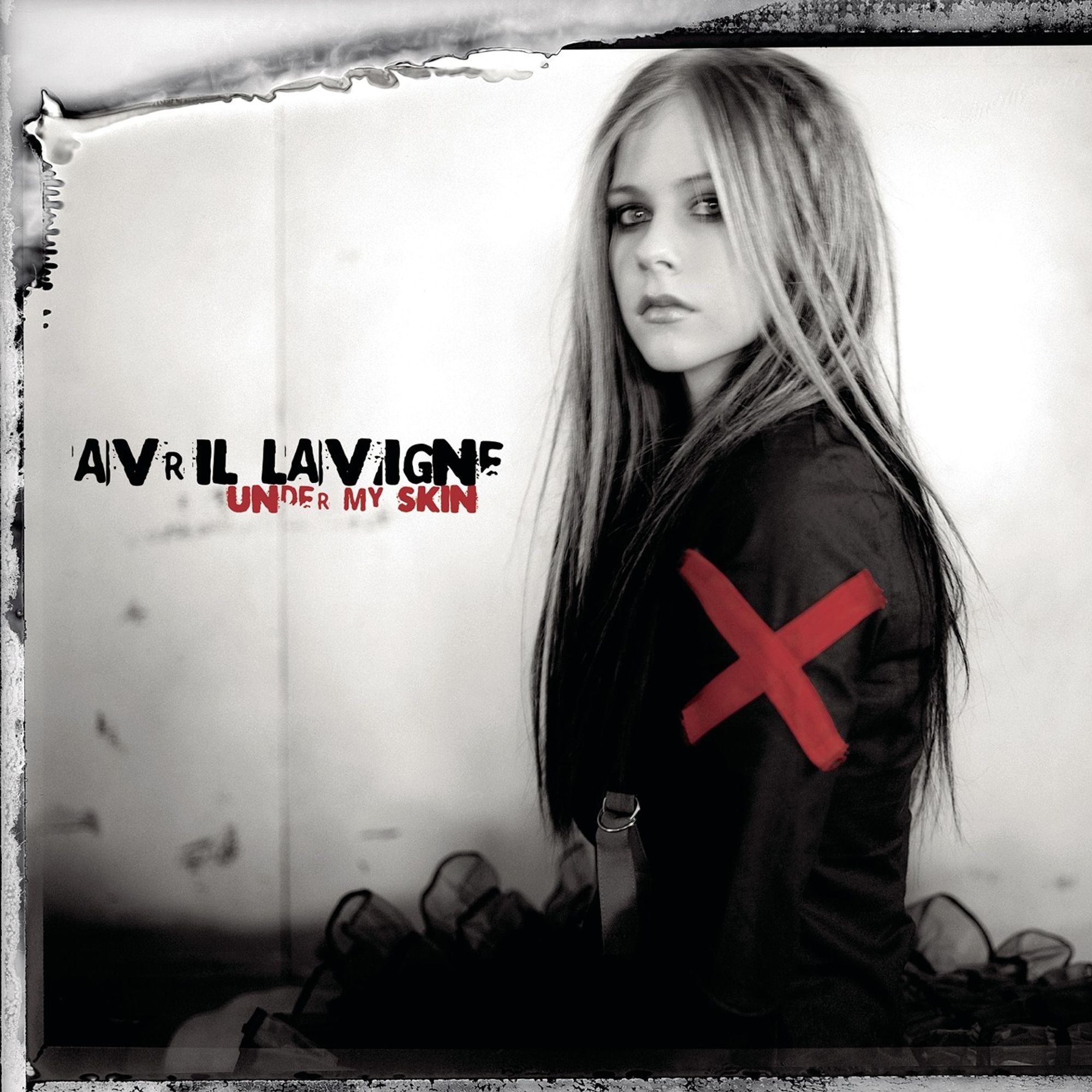 Album artwork for Under My Skin (2004), by Avril Lavigne.