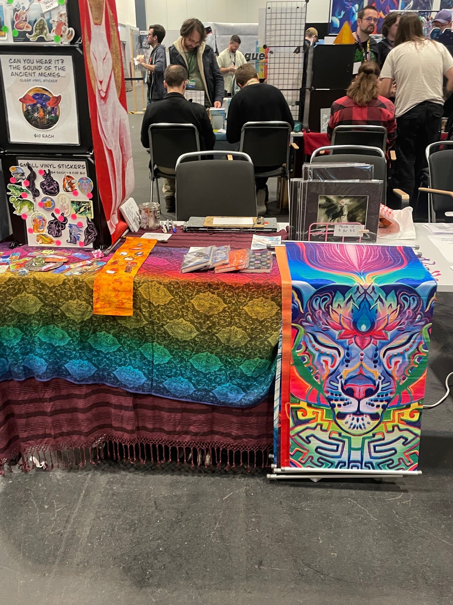 Photo of a dealers table at a furry con