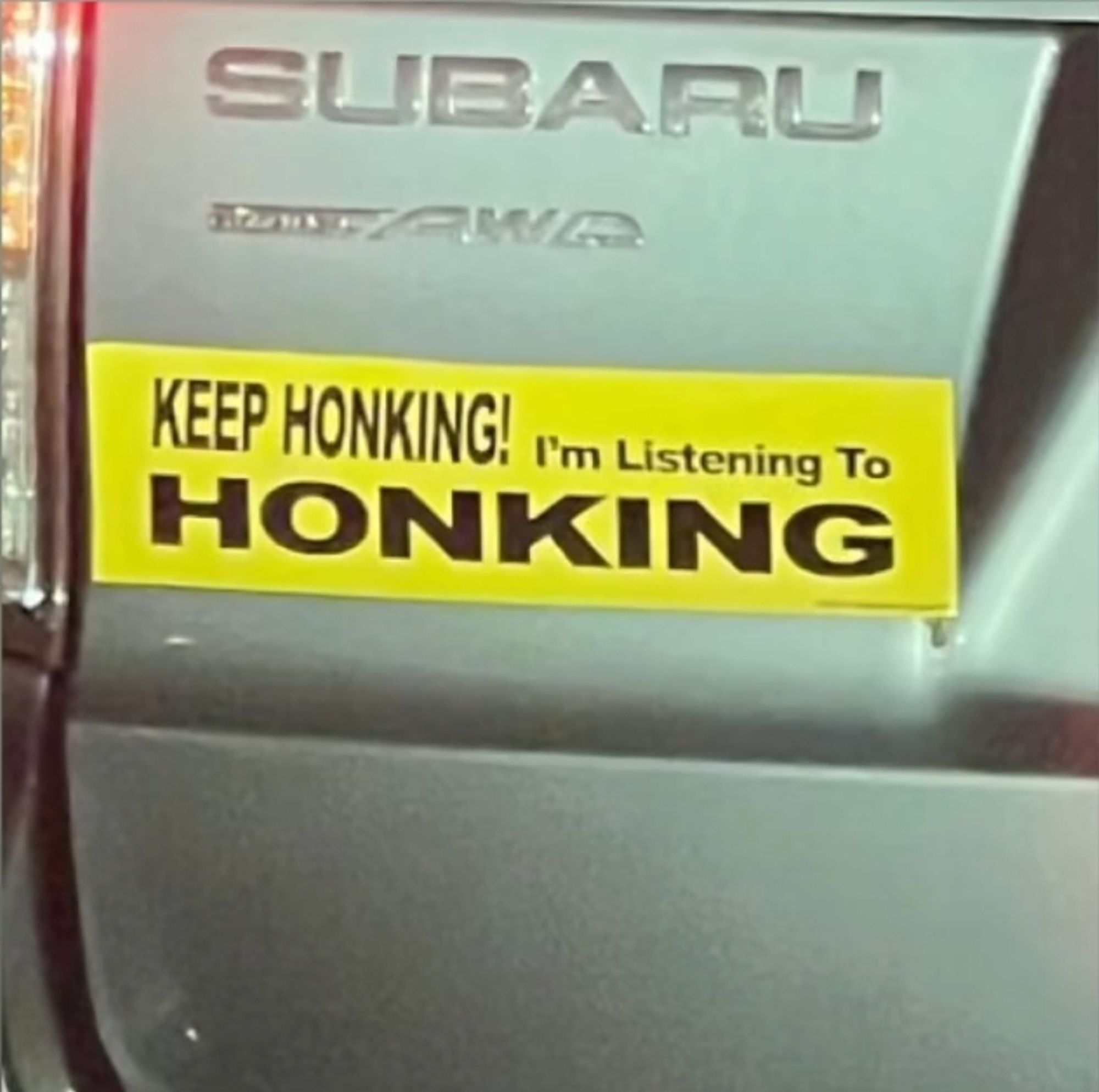 bumper sticker that says "keep honking! I'm listening to honking"