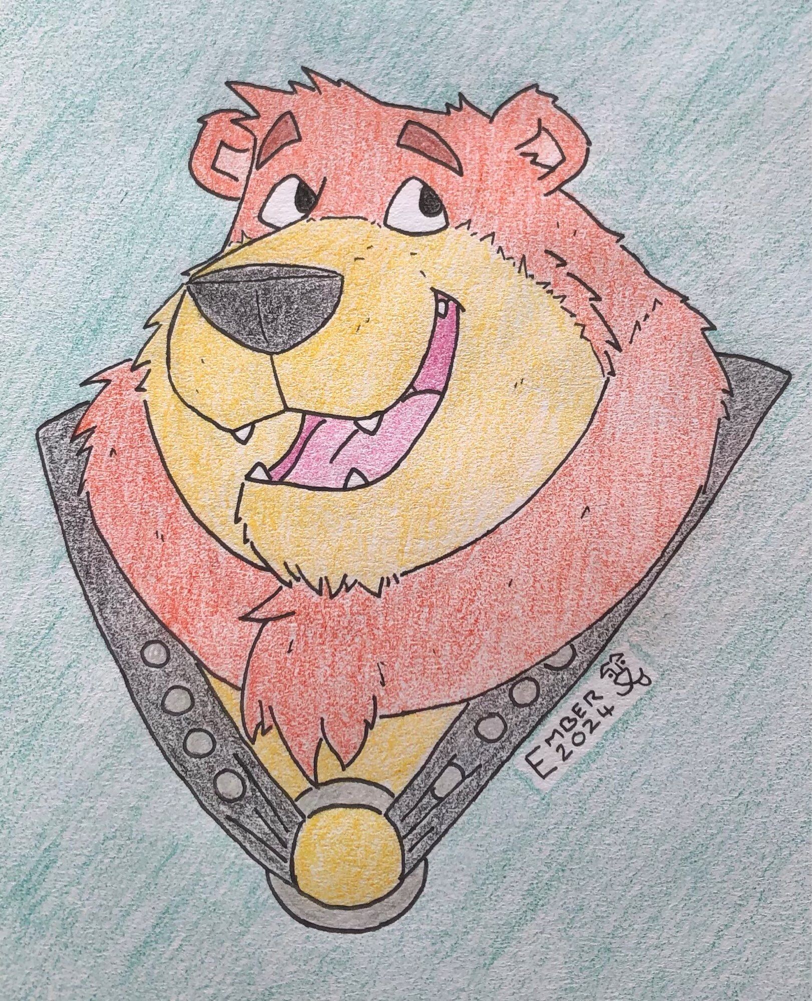 Orange bear with yellow muzzle, smiling with mouth open and wearing a black leather harness around its chest