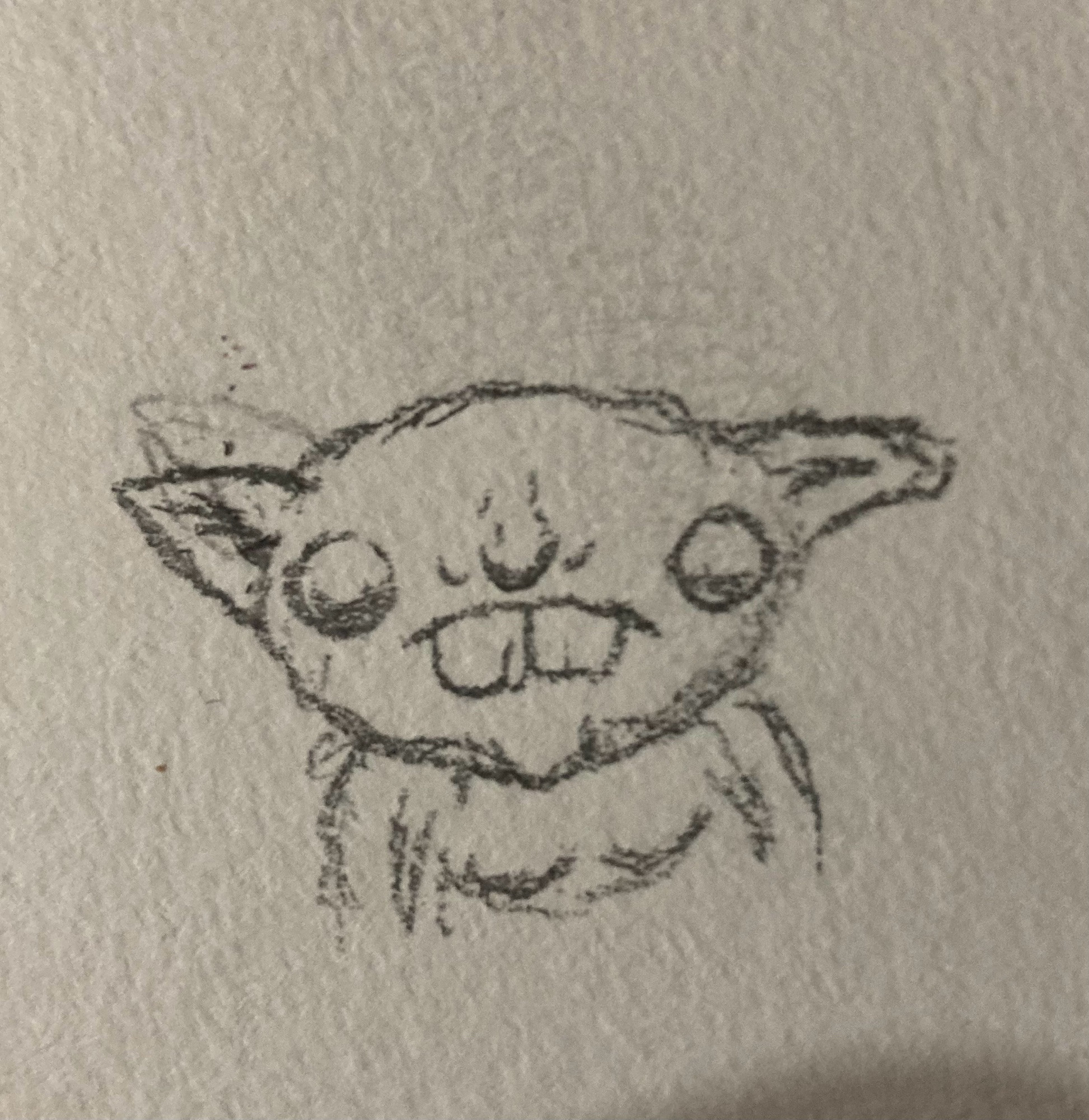 A sketch of a goblin with buck teeth and two large round eyes 