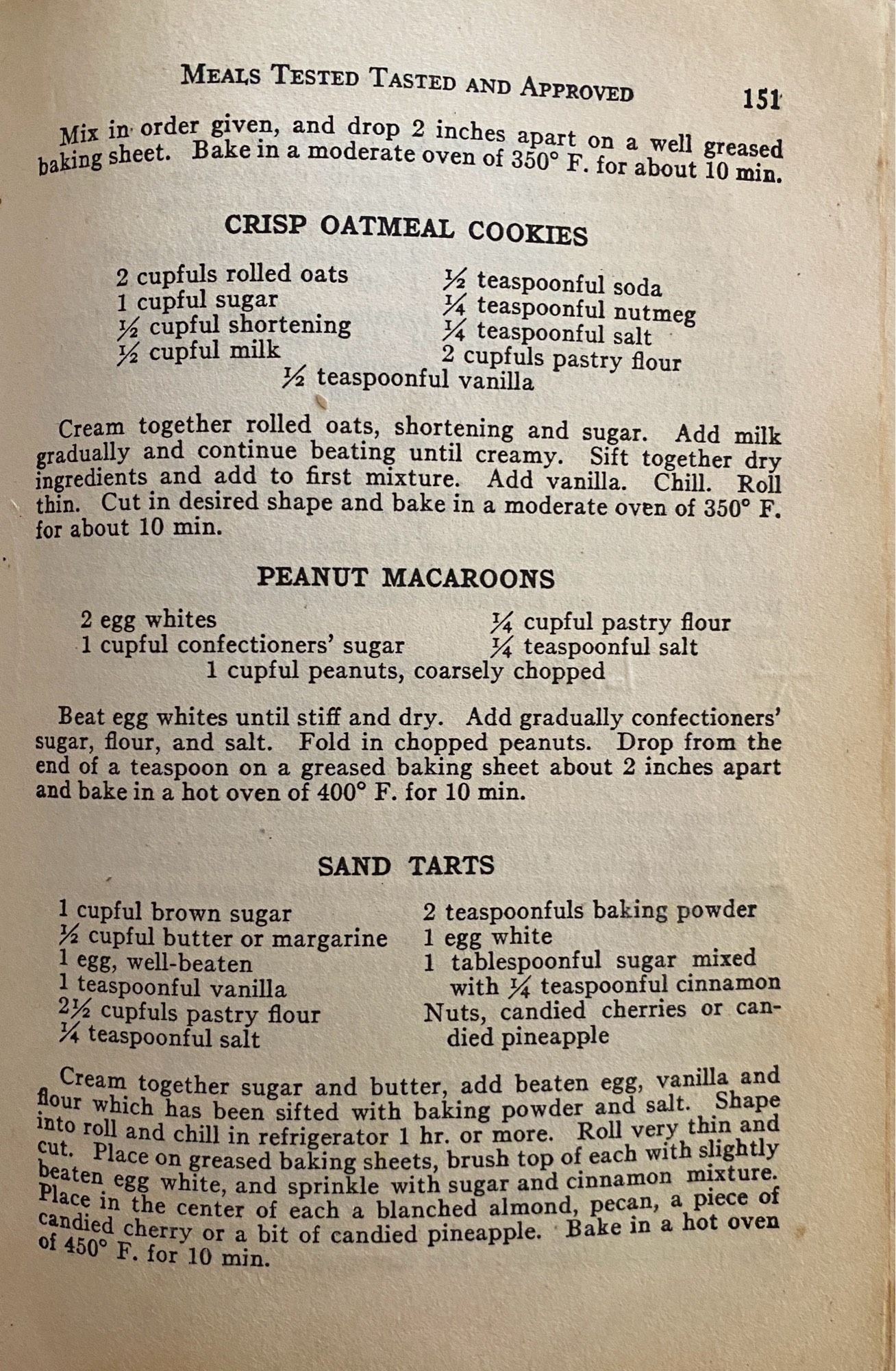 Page from cookie recipe section with recipes for Crisp Oatmeal, Peanut Macaroons and Sand Tarts. Never heard of that one before.