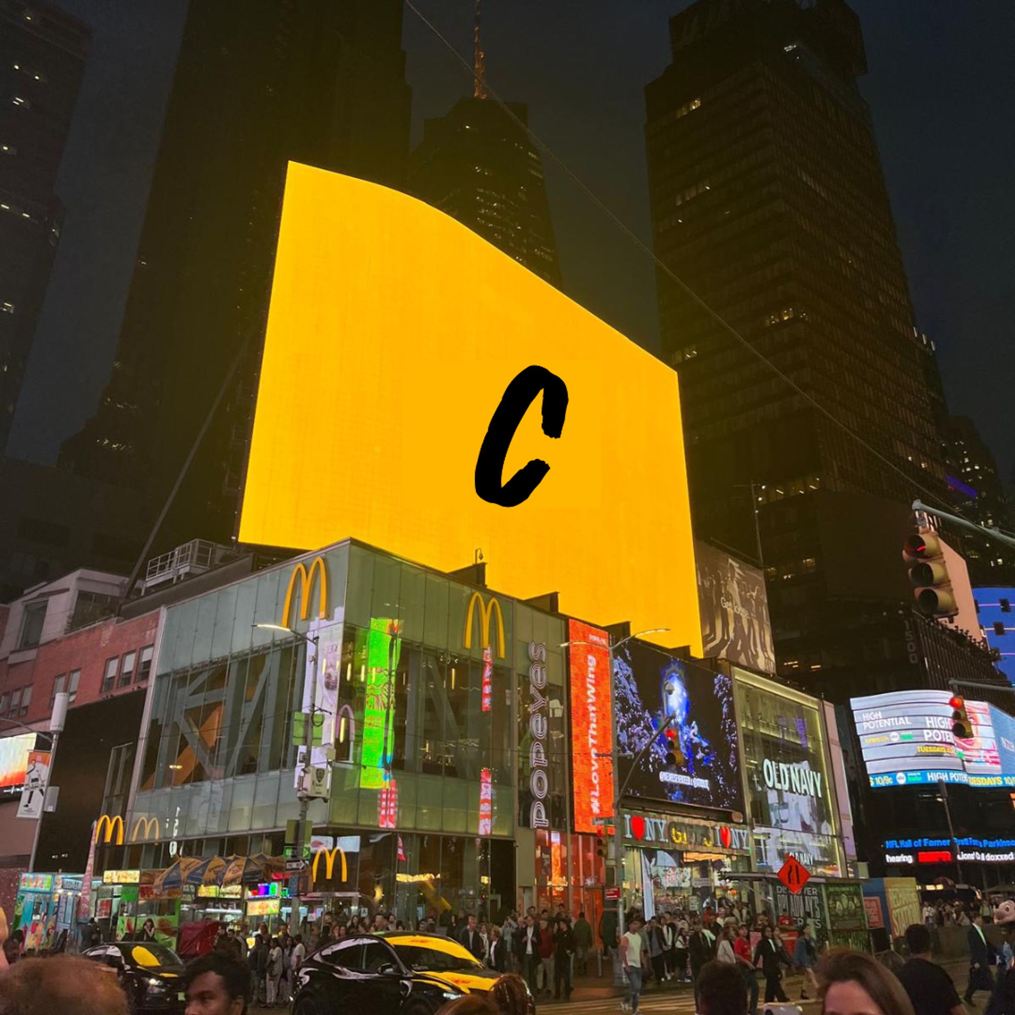 Picture of the Camerados Logo in Times Square.