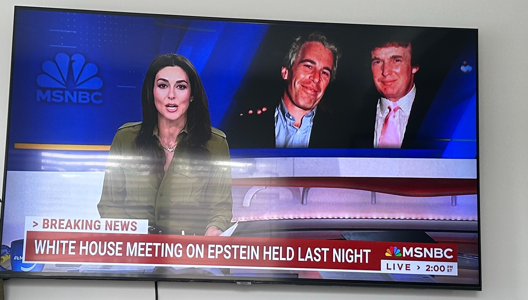 a screengrab from MSNBC with the chyron "white house meeting on Epstein held last night"