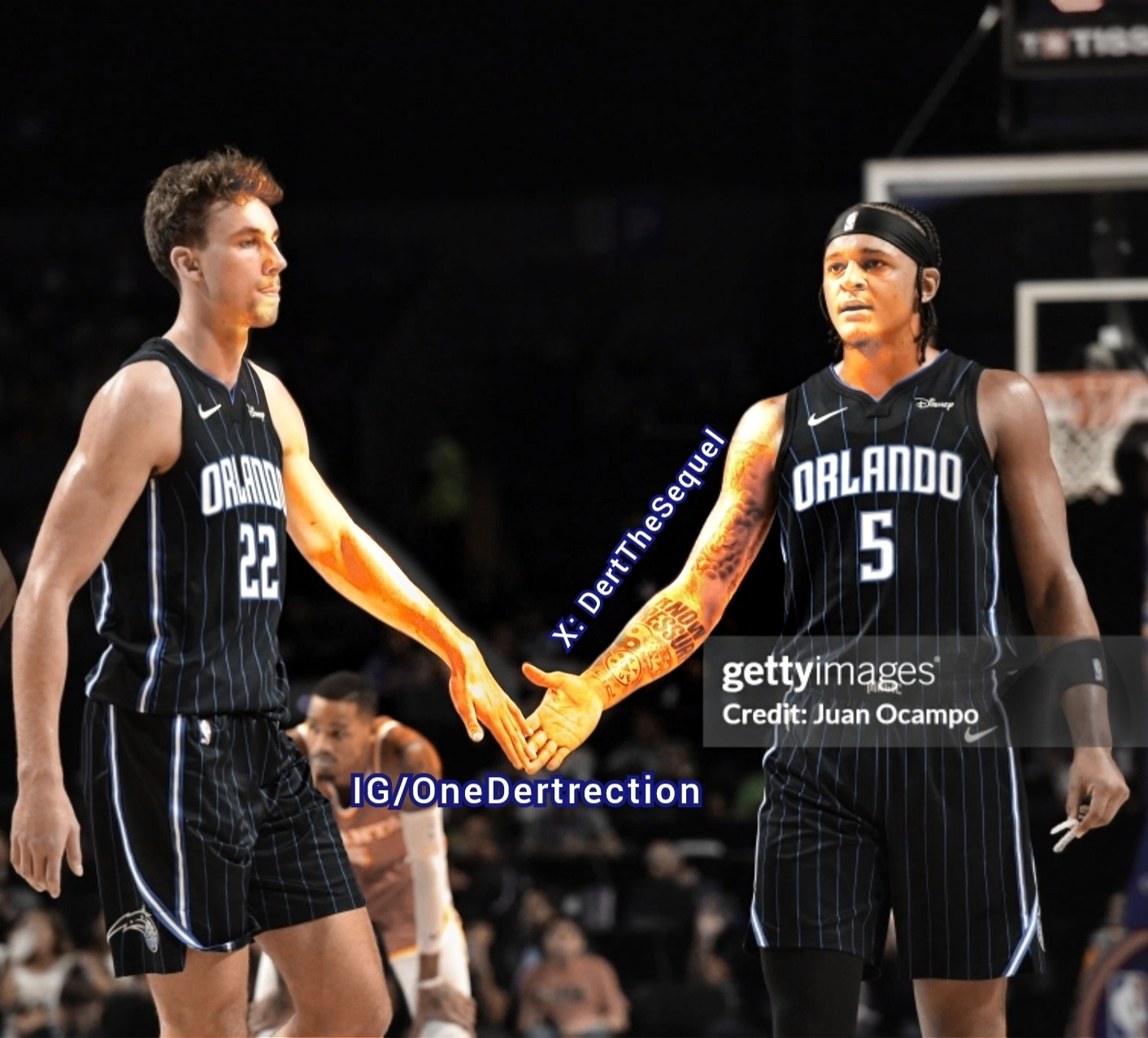 Franz Wagner and Paolo give each other a high five during a magic vs Hawks game. Their hands and arms are colored gold where they touch