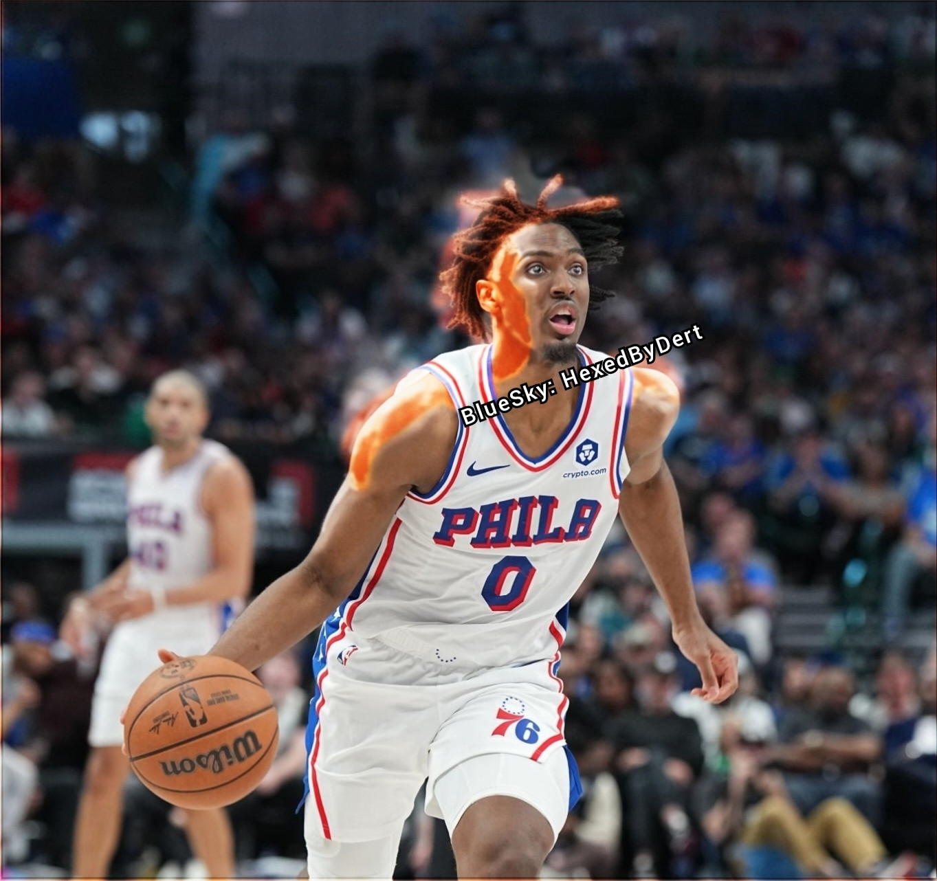 Tyrese Maxey in a white Sixers Phila 0 jersey and half of his face, hair and both shoulders have been edited bright orange to make him look like he's on fire or lava