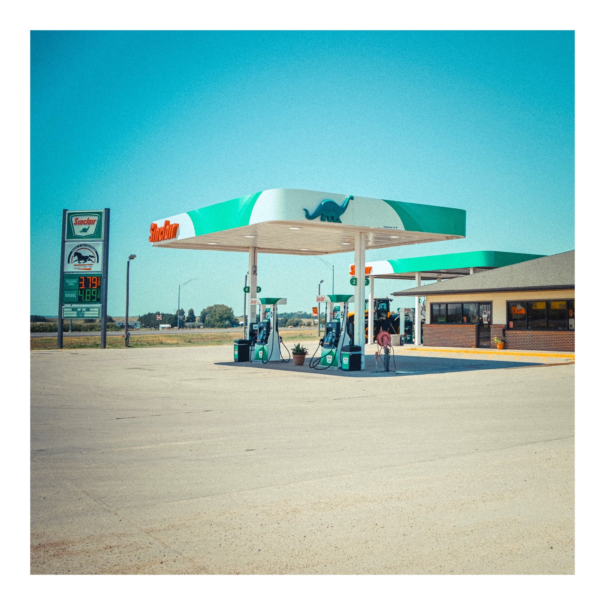 I tried to replicate a film look here with washed out colours, but intense blues.  Kodak Ektachrome, pale greens of the gas station forecourt, aqua blues of the sky & warm yellow tones of the concrete