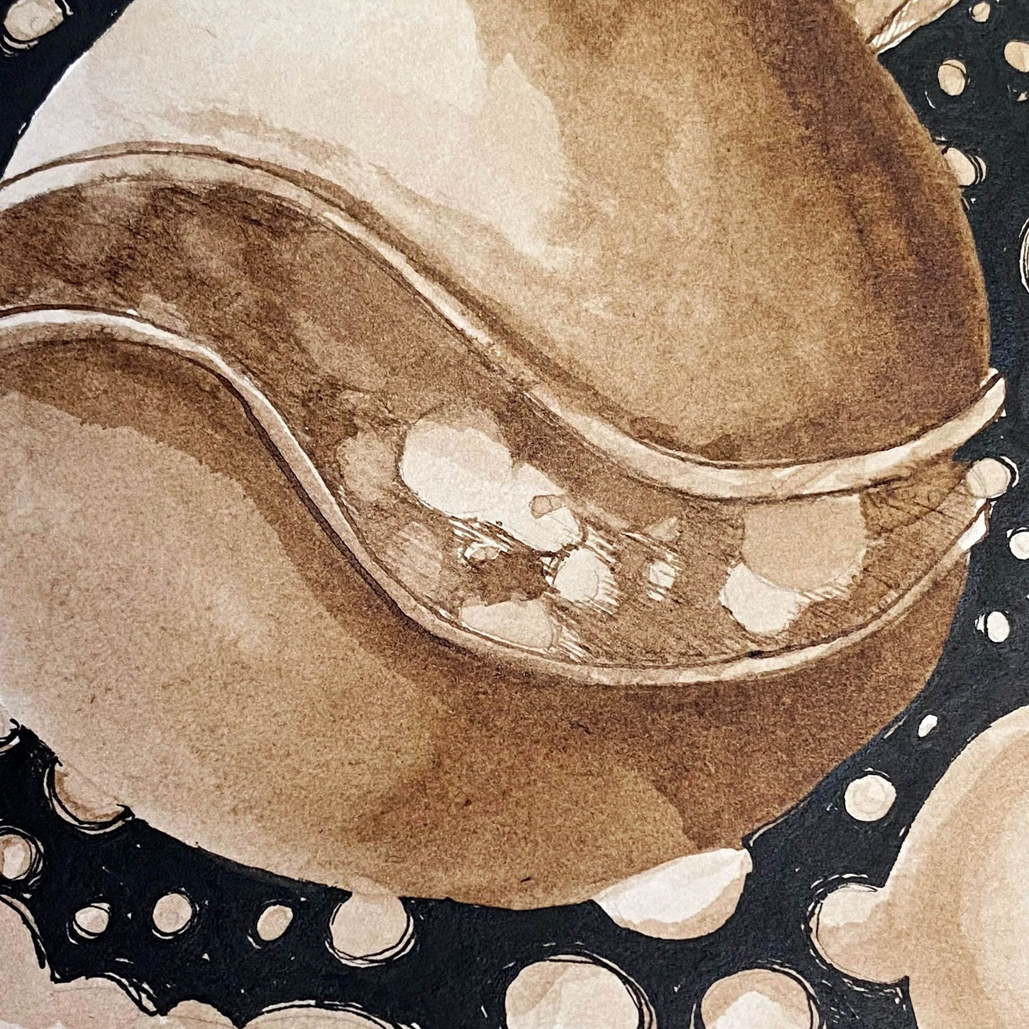 Closeup of walnut ink washes in the orb part