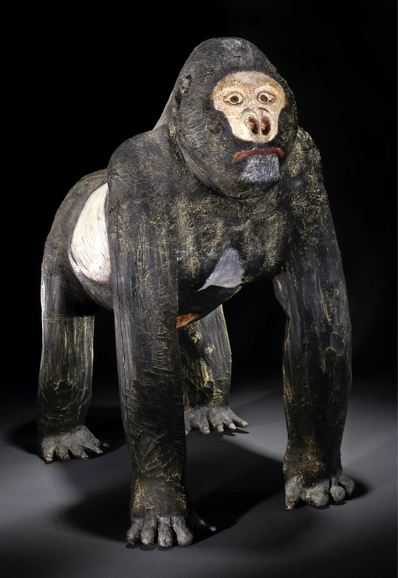 official museum photo, gorilla sculpture in a quadrepedal stance