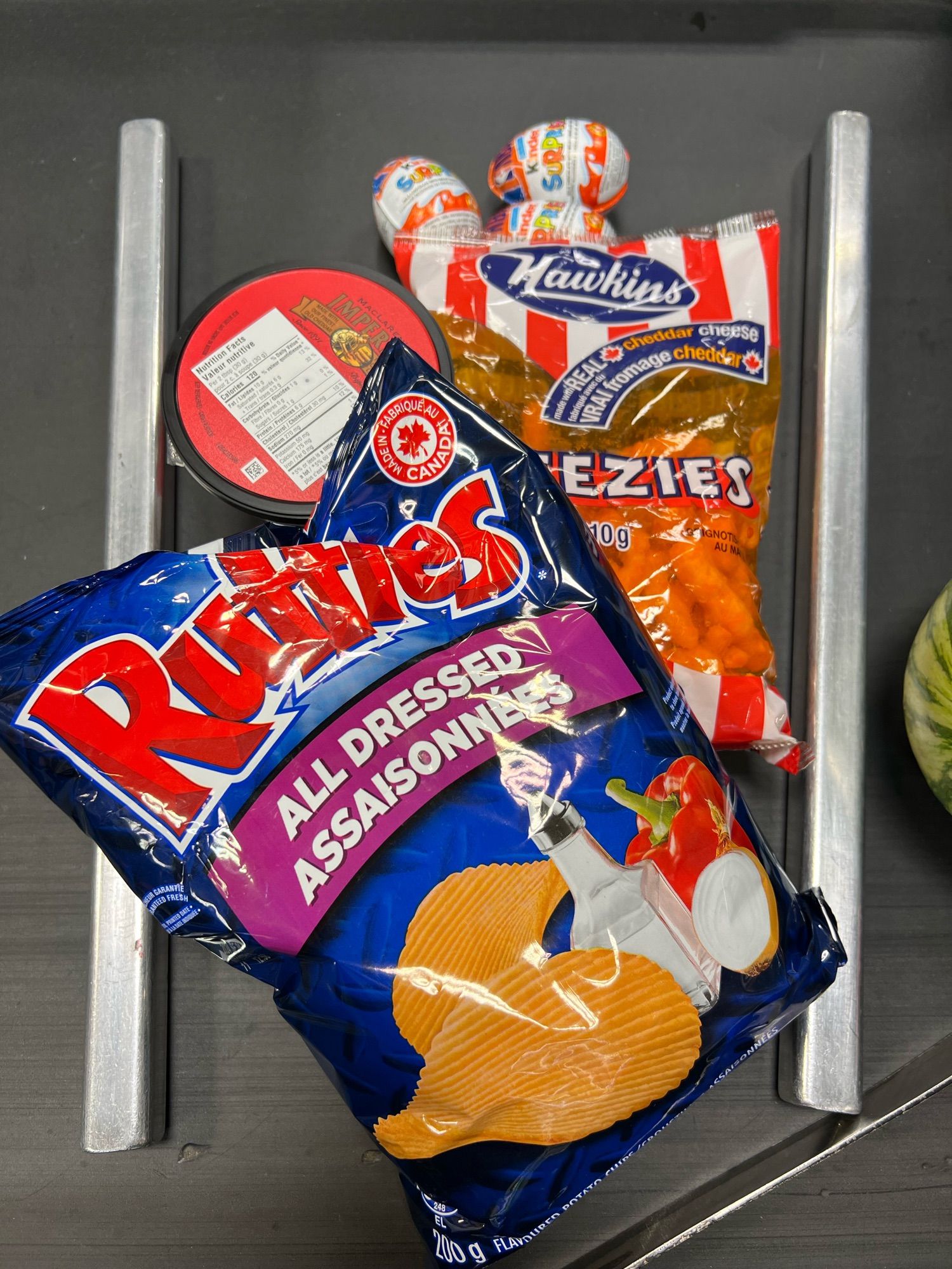 Grocery belt with some Canadian favourites: Hawkins cheezies, all dressed Ruffles, Maclarens imperial cheddar. The three kinder surprises will need to be enjoyed before we return to the US.