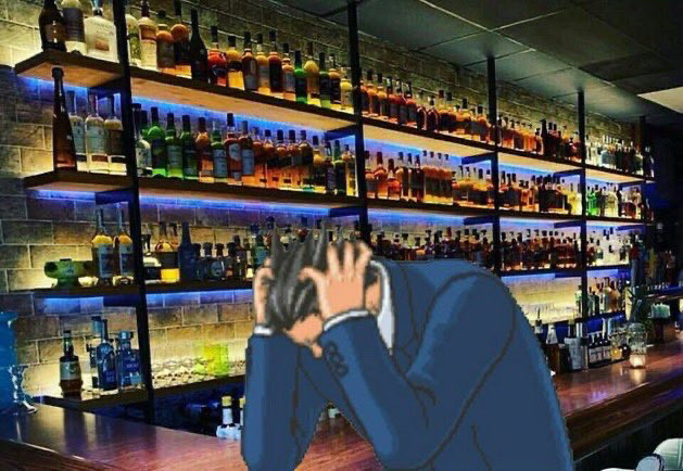 Phoenix Wright from his titular series Phoenix Wright: Ace Attorney clutching his head in his hands down at the local bar