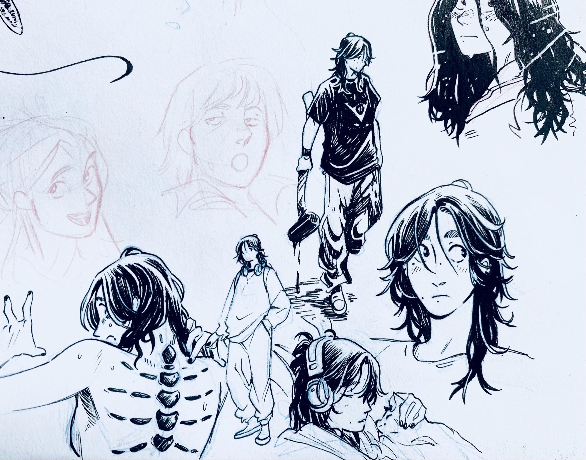 Several small inks of a character with messy dark hair