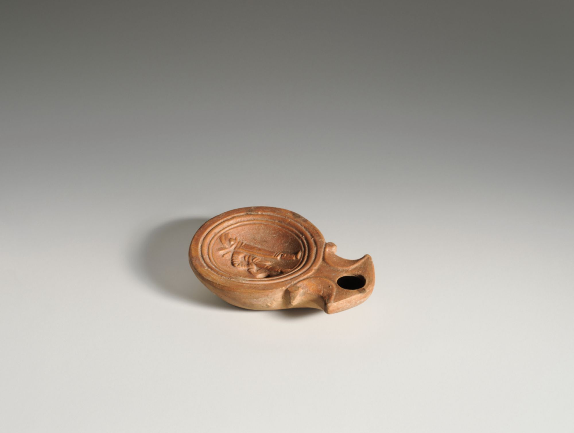 Terracotta oil lamp, Metropolitan Museum of Art, New York, NY