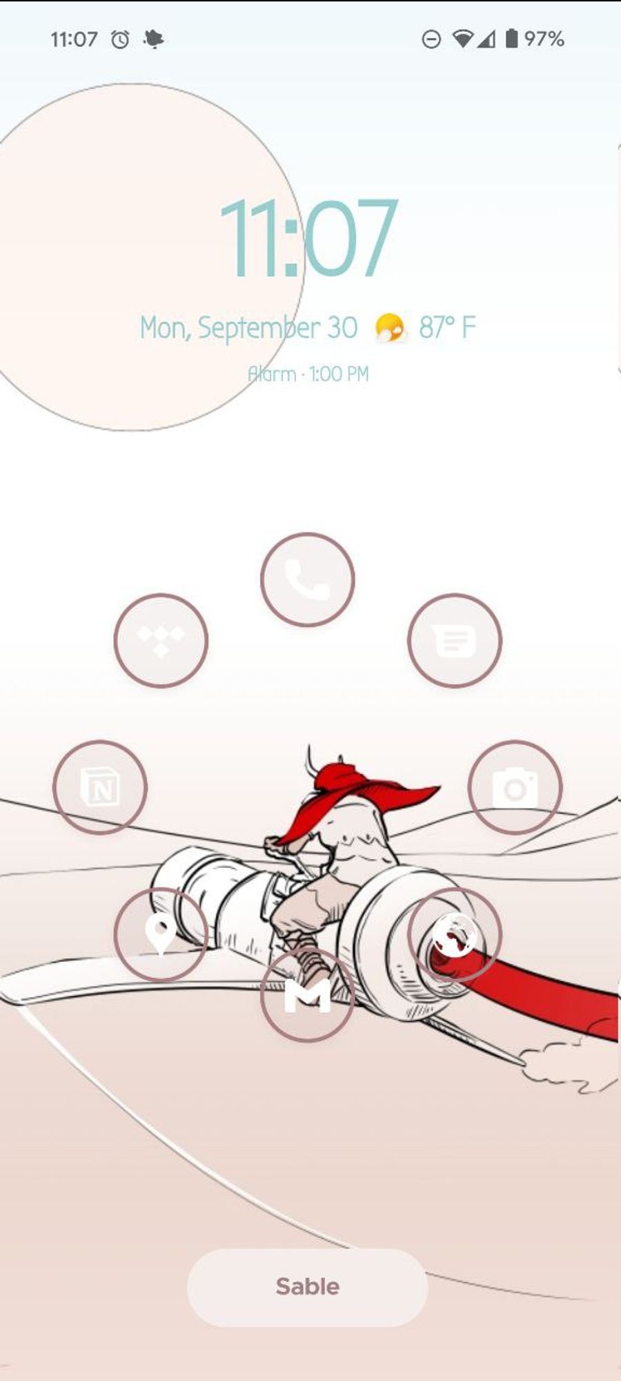 A phone screen showing fan art of the game "Sable". A young girl rides a sci-fi hovering sand bike, jetting across the desert away from the viewer. She is wearing a horned masked and bright red cloak. A large pale sun hangs overhead. Overlaid on this image are phone icons.