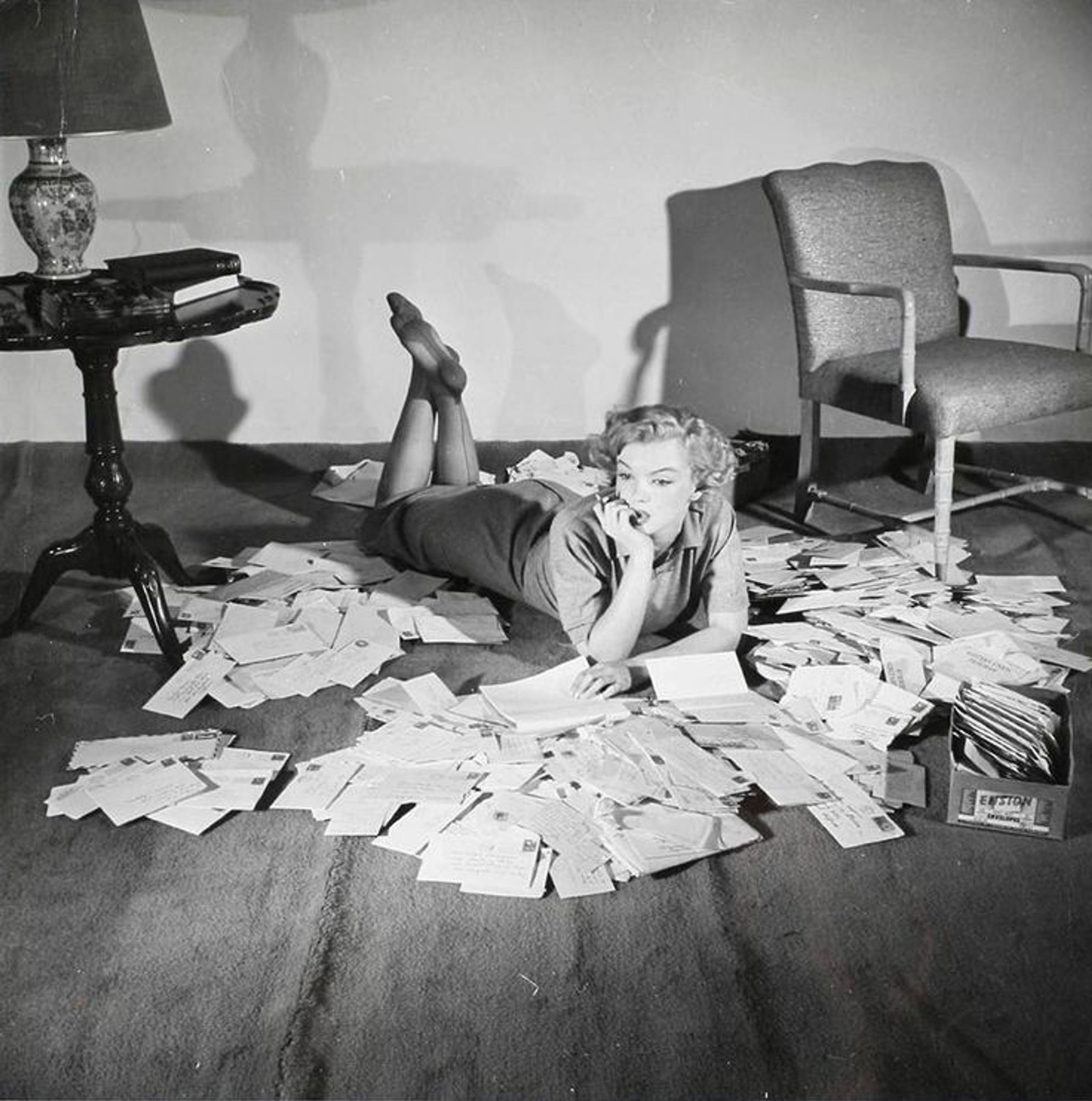 Marilyn Monroe laying on the floor, surrounded by piles of fanmail letters. Just like Caspar when he receives your letters for his Animus column!