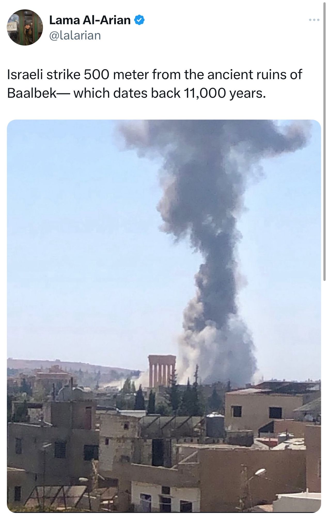 Lama Al-Arian @lalarian
Israeli strike 500 meter from the ancient ruins of Baalbek— which dates back 11,000 years.

Pic is of a plume of debris and possibly human beings rising right next to classical columns of the 2k year-old Temple of Jupiter.