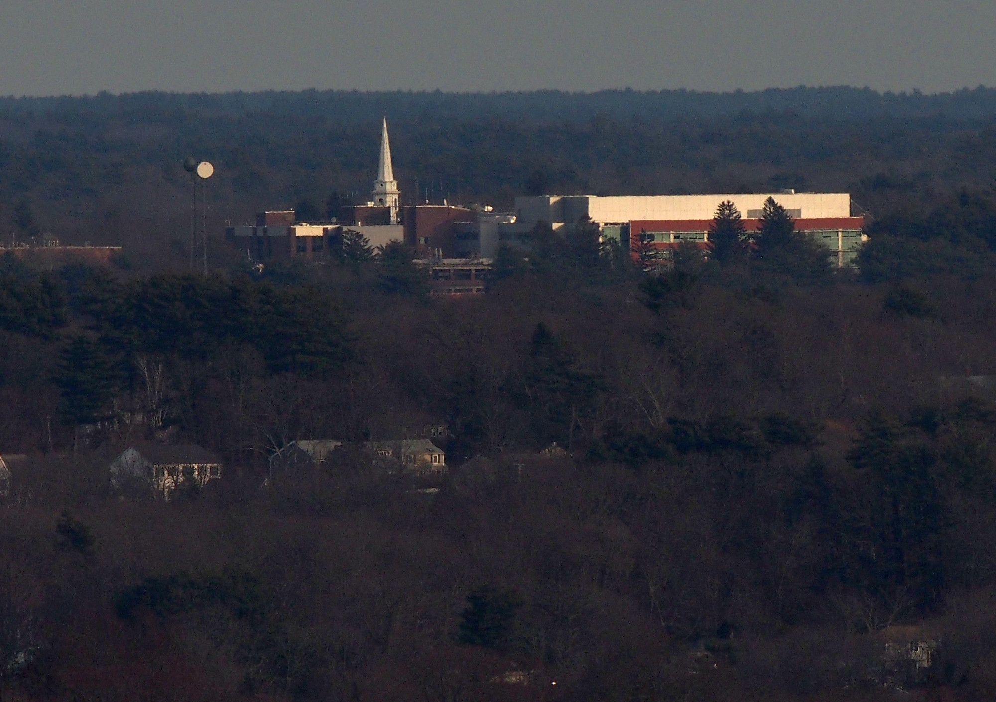 South Shore Hospital, 55 Fogg Rd, and Old South Union Church, 25 Columbian St both in South Weymouth MA photographed from Buck Hill.

The communication tower is located at 60 Columbian St, Braintree MA. It is the former MA State Lottery office and the building was property was purchased by Mass General Brigham in 2021.

The houses that are visible on the lower left, from left to right 1054 Liberty St, 18, 22 and 28 Forest St and 47 Sycamore Rd. The house in the lower right is 11 Trainor Dr. All of the house are in Braintree MA.

#buckhill #bluehills #bluehillsreservation #boston #BostonMA #Braintree #BraintreeMA #Weymouth #WeymouthMA #SouthWeymouth #SouthWeymouthMA #landscape #LandscapePhotography #photography #LongDistanceObservations