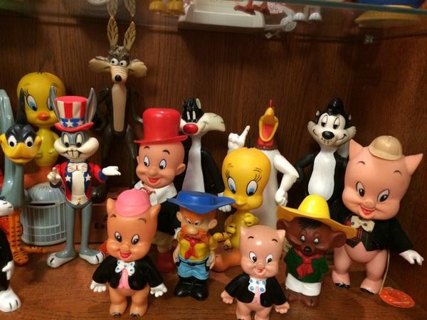 Dakin figures, all circa 1976.  I'll not mention those already covered by the previous photo.  Porky Pig in the front is a hard plastic figure.  Porky Pig, Yosemite Sam, and Speedy Gonzales behind the hard plastic Porky Pig are squeaky toys.  Elmer Fudd, Tweety, Porky Pig, Sylvester, and Foghorn Leghorn are hard plastic figures with jointed arms and legs.  Pepe Le Pew is also a jointed figure but stands on a plastic base.