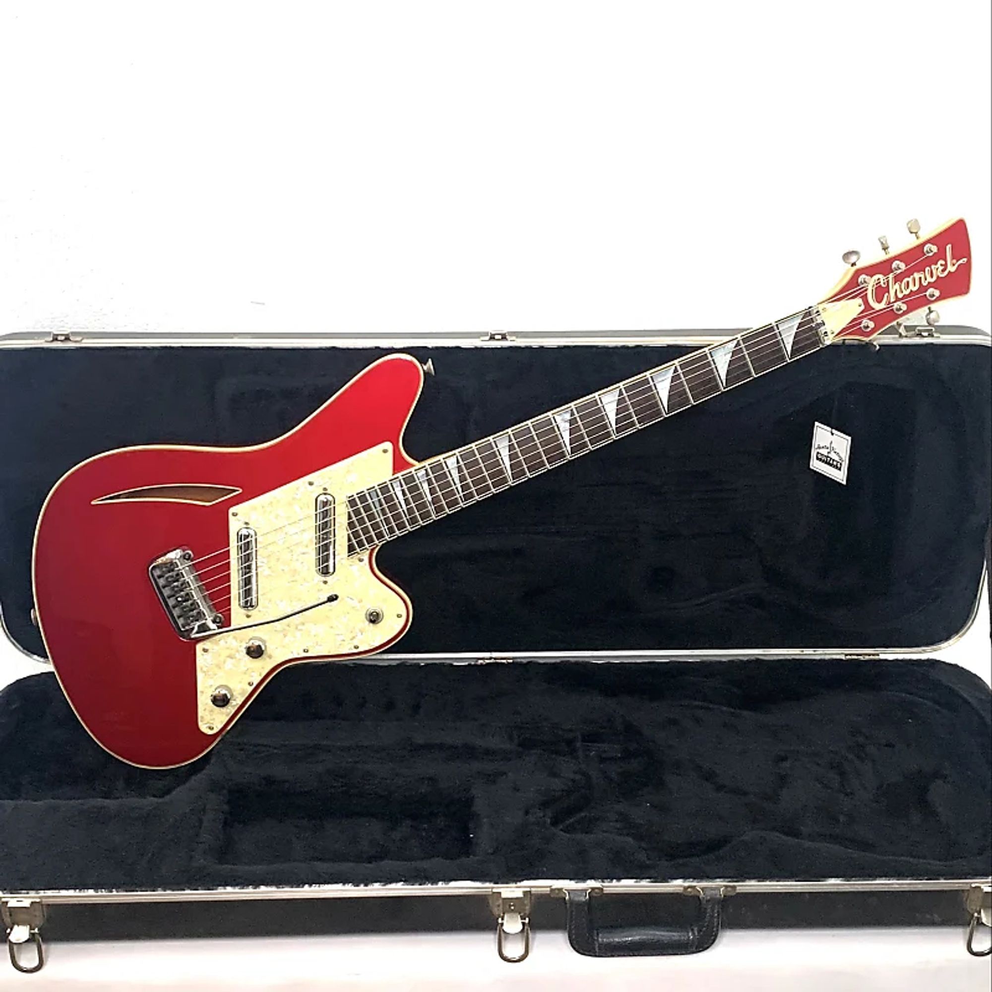 The Charvel Surfcaster is a semi-hollow electric with a curved triangle soundhole. It's got two angled single-coil pickups, a Strat-style trem, one volume and one tone control, and a 3-way switch. It's another discontinued model that Eastwood is making a version of now, but you can buy a real Charvel on Reverb (specifically, this one) for the same price Eastwood is selling theirs for.