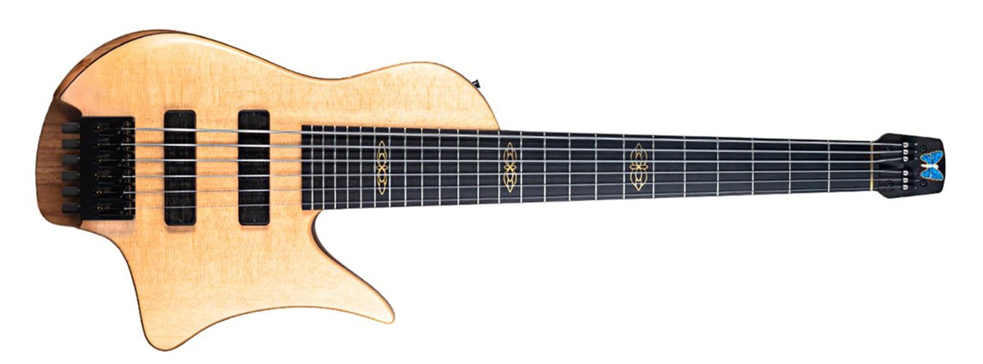 The Fodera Crescent bass is a 6-string with a long upper bout (going all the way to the 12th fret!) and a deep lower cutaway. A curve below the bridge as well as a curve on the bottom give you different ways to hold it on your lap when you're sitting down. The controls for the dual coil passive pickups are on the top of the body. There are neat inlays on the 7th, 12th, and 19th frets and a Fodera butterfly logo on the headstock, but those aren't the coolest artistic touches on the bass.