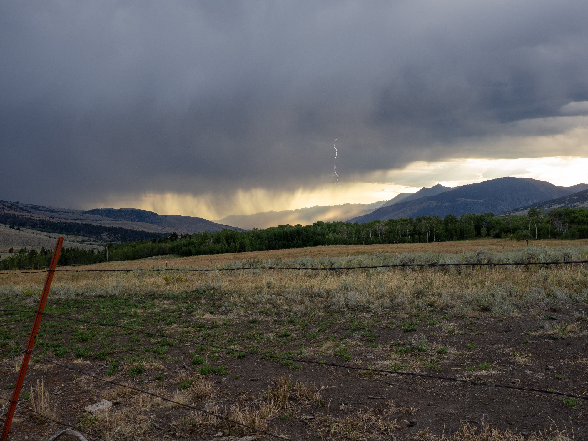 Storm over the Absarokas, with lightning bolt.