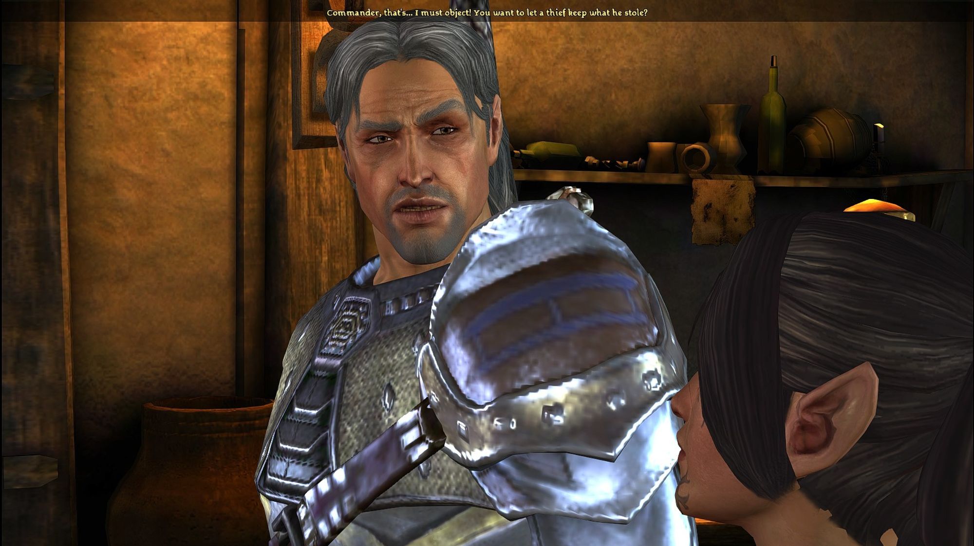 screenshot from Dragon Age: Awakening, conversation with Varel after deciding to let Nathaniel leave with his family's belongings. Varel's dialogue reads: "Commander, that's...I must object! You want to let a thief keep what he stole?"