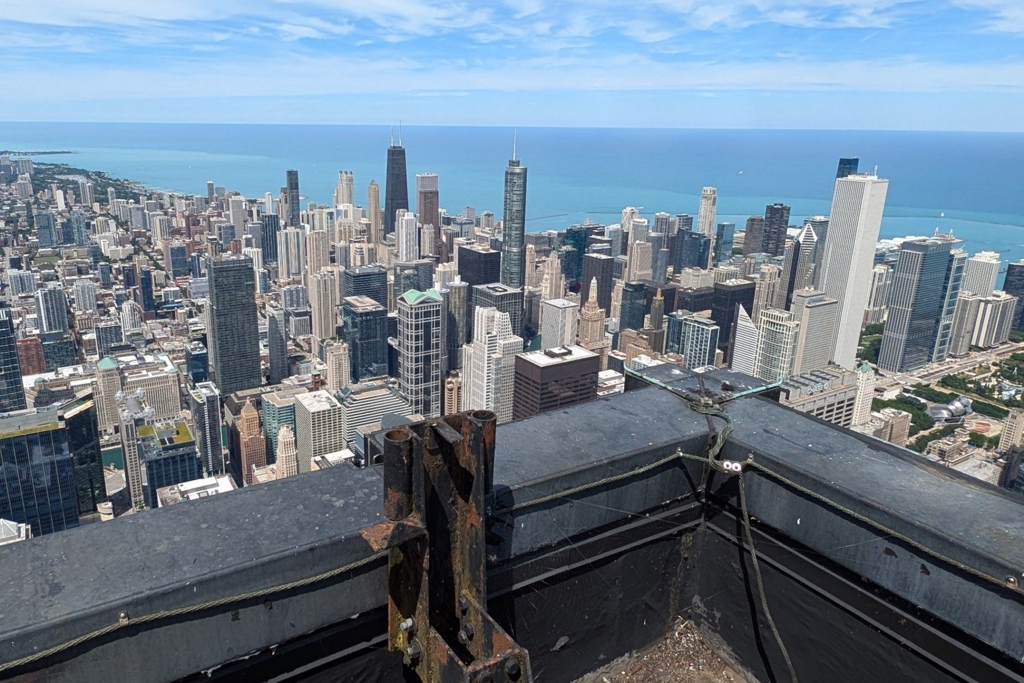 Buildings/skyscrapers from perspective of the highest roof in Chicago.