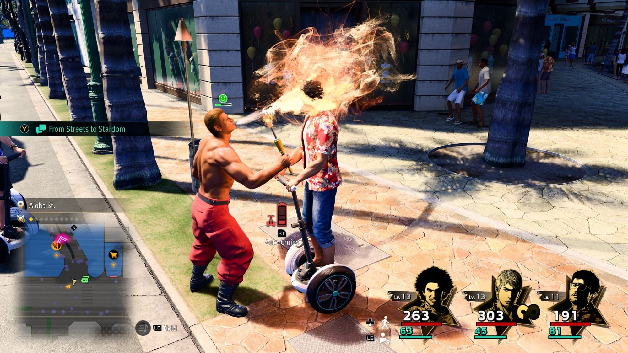 Screenshot from Like A Dragon: Infinite Wealth. Kasuga Ichiban on a Segway, a fire breather is breathing fire right into his face, and Ichiban does not seem to care about it.