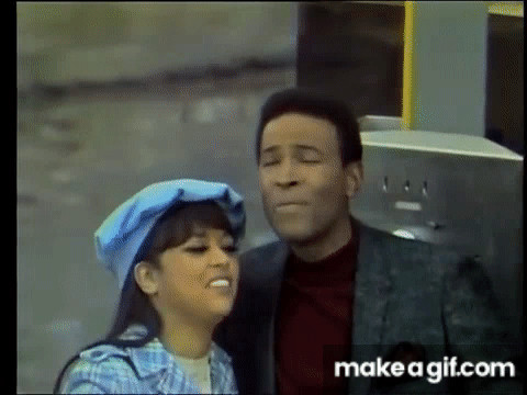 Marvin Gaye and Tammi Terrell singing "Ain't No Mountain High Enough"