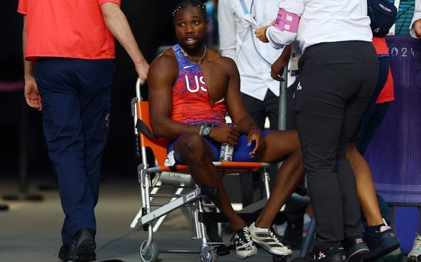 Noah Lyles has COVID and gets wheeled out after racing at the Paris Olympics