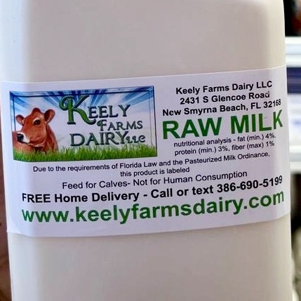 A milk label for the raw milk product in question. In tiny text it says "Due to the requirements of Florida Law and the Pasteurized Milk Ordinance, this product is labeled Feed for Calves - Not for Human Consumption".