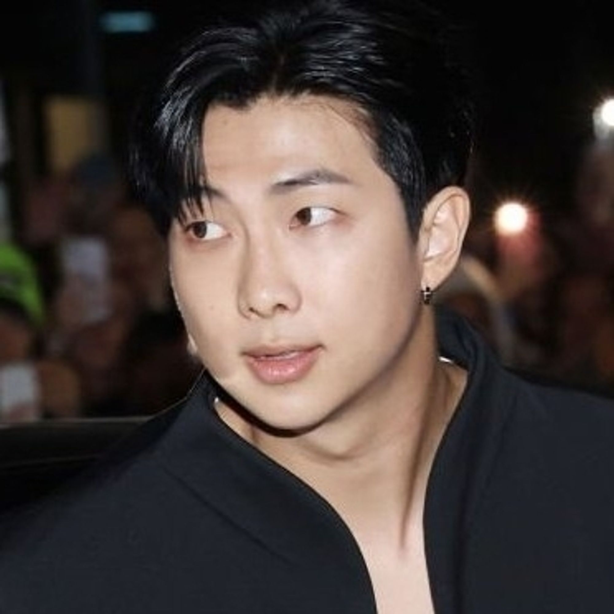 RM of BTS at the Bottega Veneta fashion show.