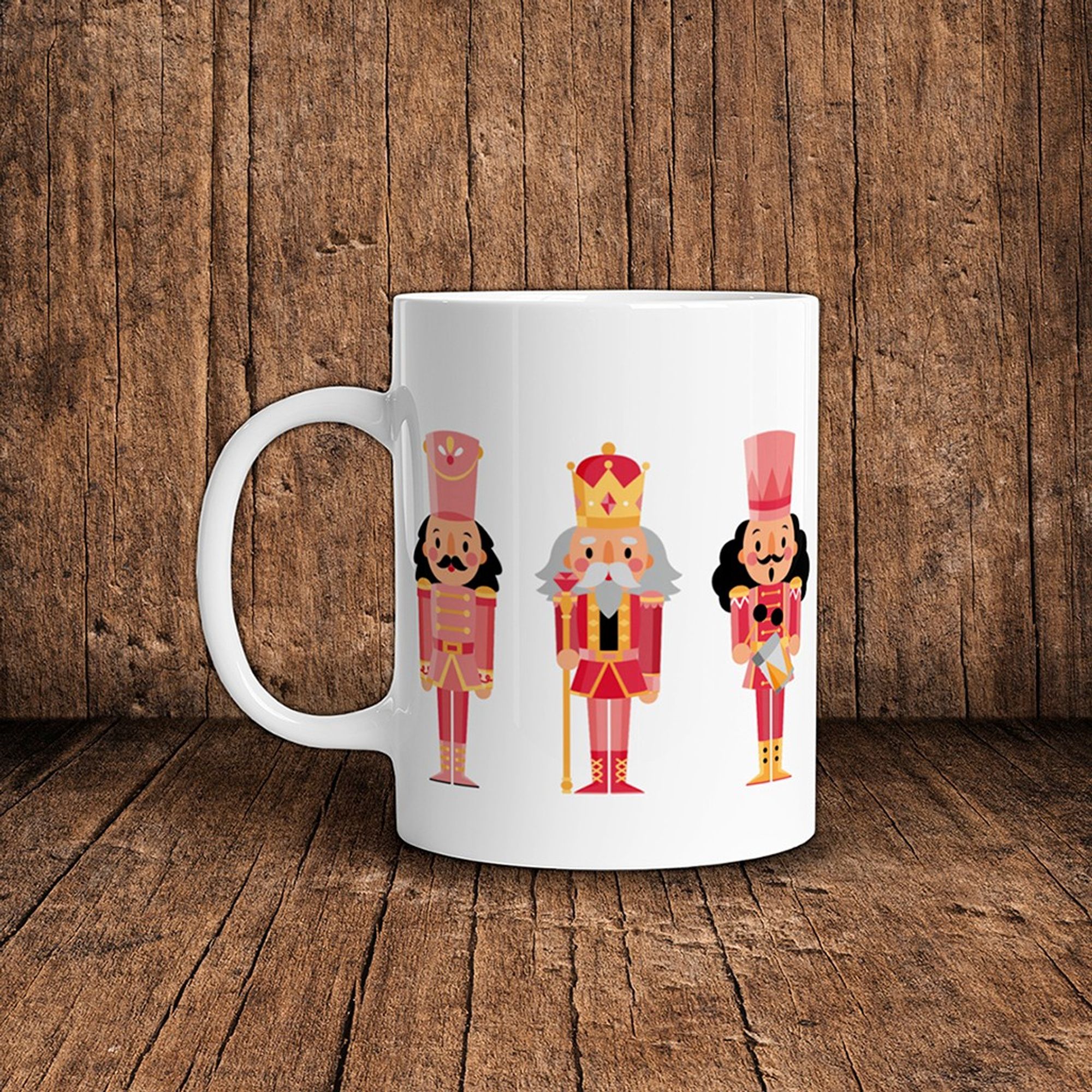 Mug en céramique au motif de 3 petits personnages de casse-noisettes, comme dans le conte de Noël. Modèle présenté  : rose