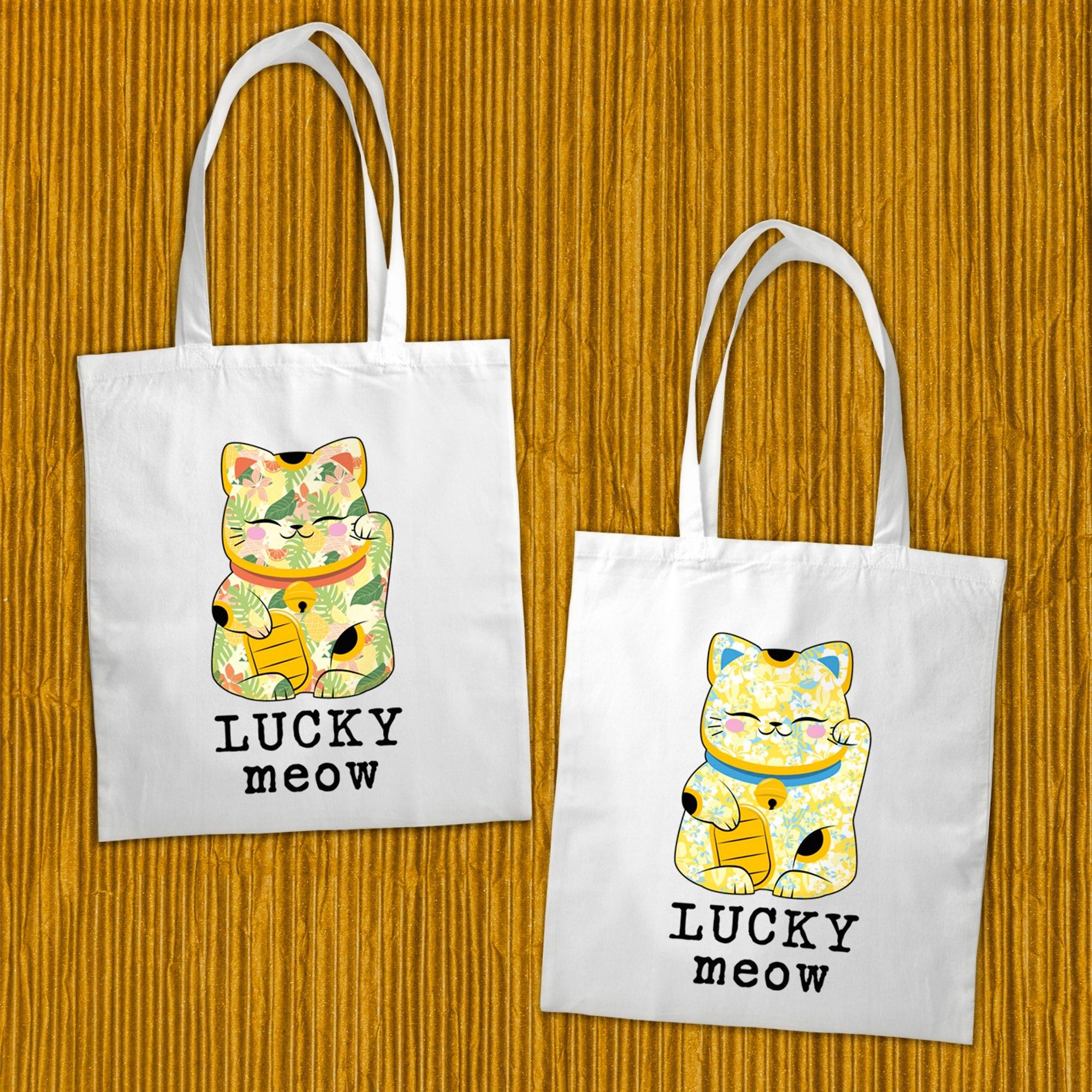 Tote bag "Lucky meow", 100% coton représentant un chat porte-bonheur à la manière d'un Maneki Neko japonais. Deux modèles au choix : fleurs bleues ou fleurs vertes.