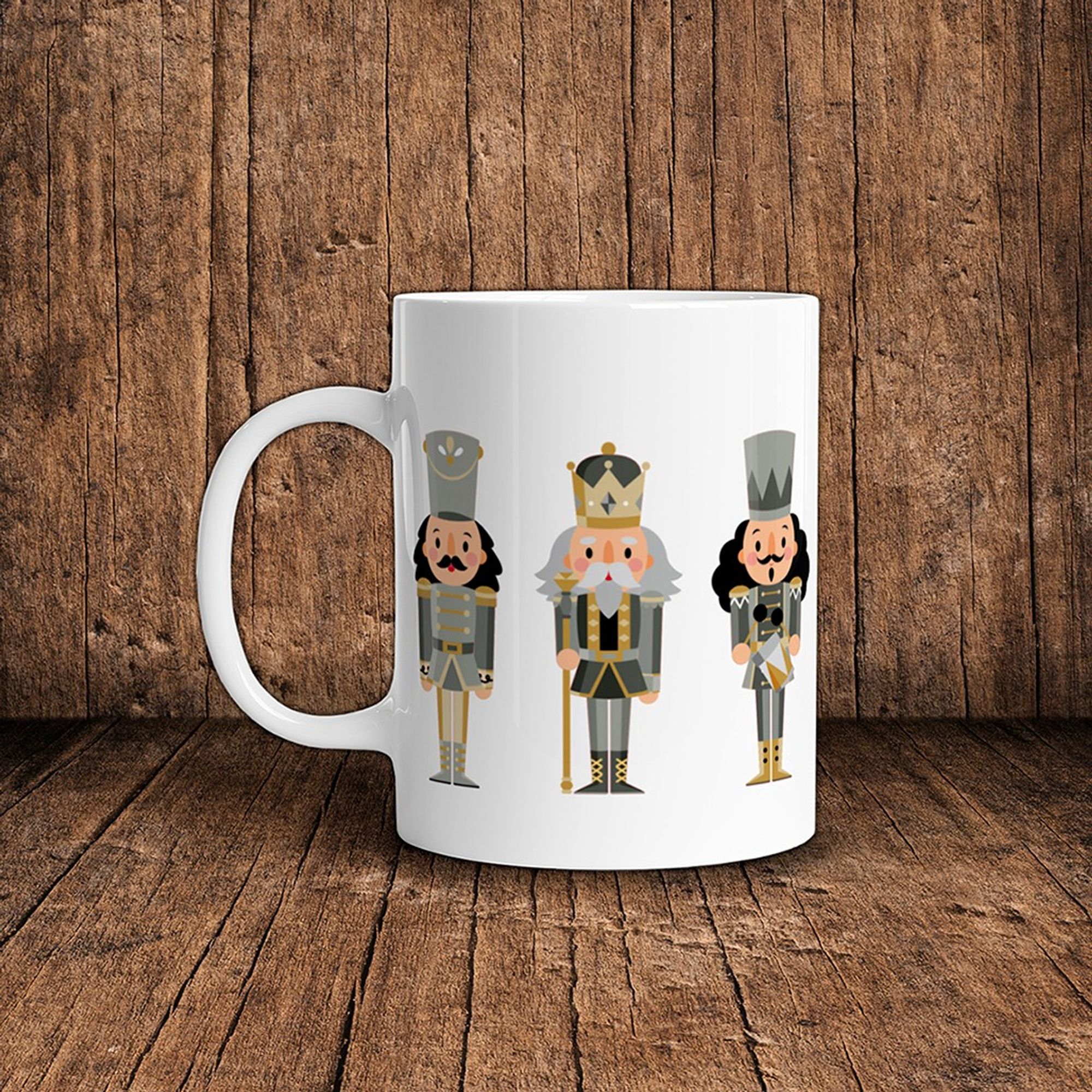 Mug en céramique au motif de 3 petits personnages de casse-noisettes, comme dans le conte de Noël. Modèle présenté  : gris