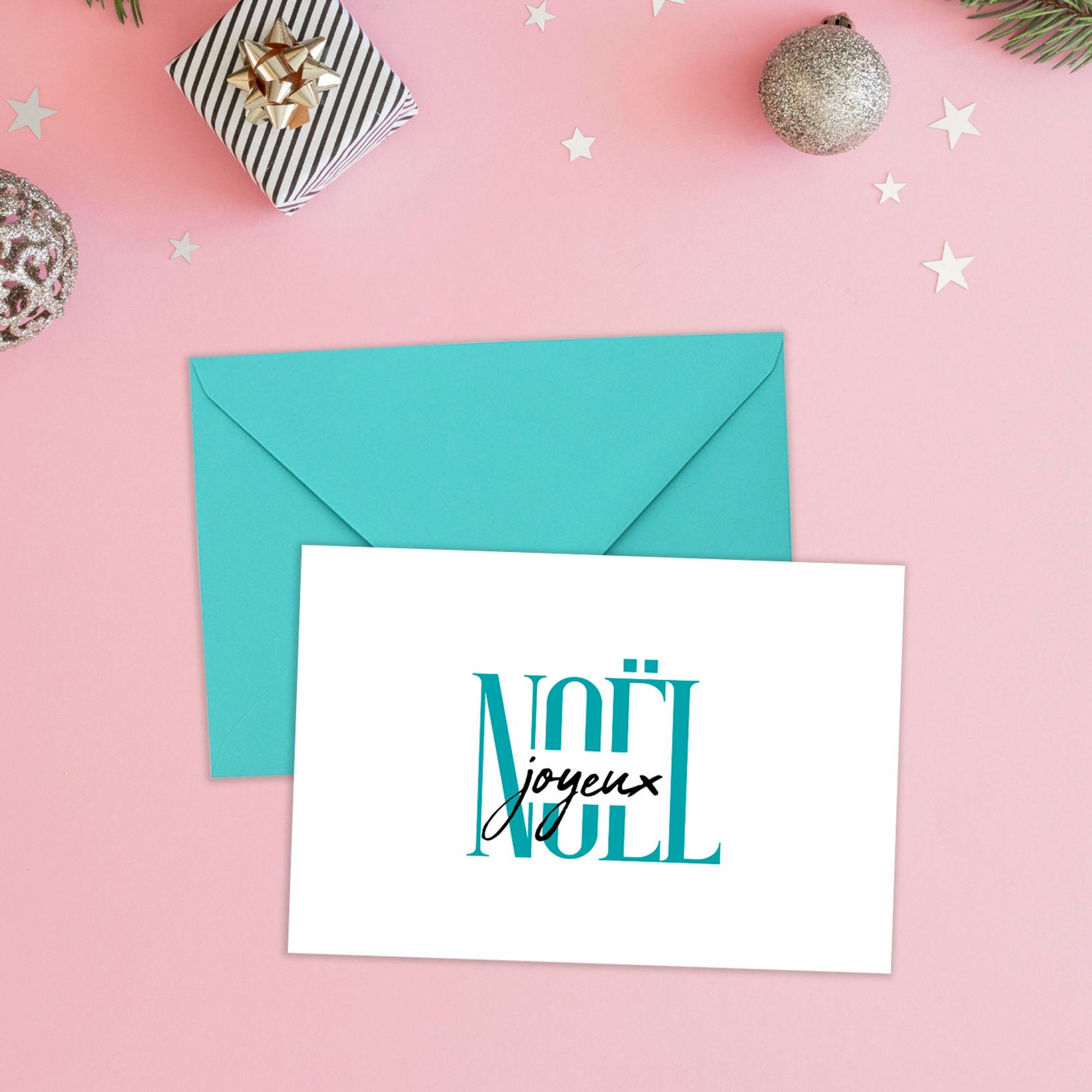 Carte de vœux illustrée simpliment par des mots "joyeux" et "Noël" supperposés. Modèle bleu turquoise.