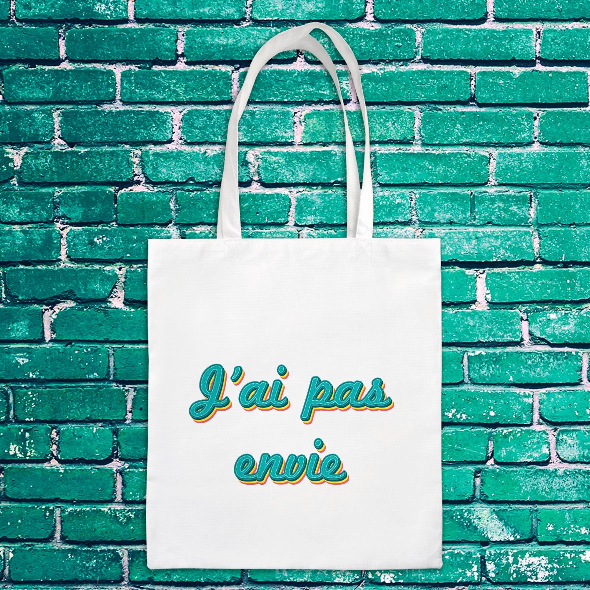 Tote bag 100% coton avec le message humoristique et coloré "J'ai pas envie" imprimé.