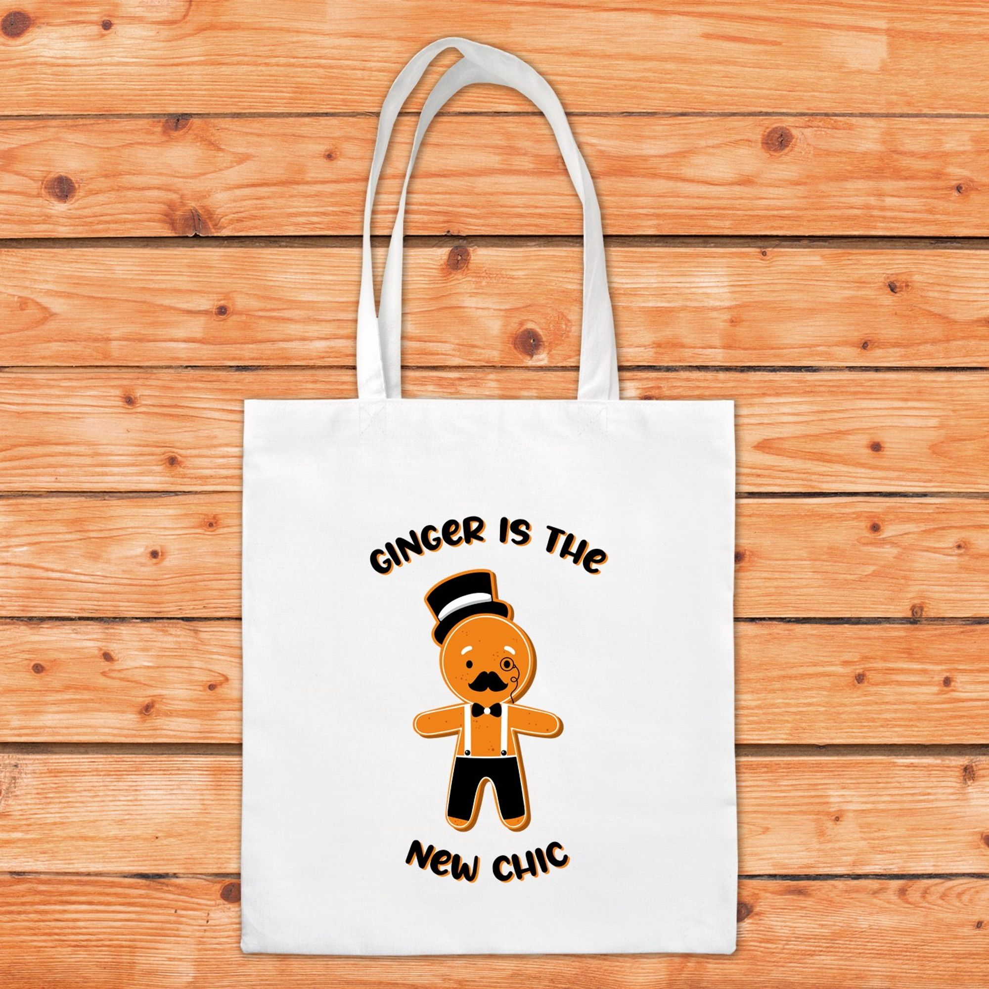 Tote bag de Noël représentant un bonhomme en pain d'épices fichtrement élégant et avec le texte "ginger is the new chic"