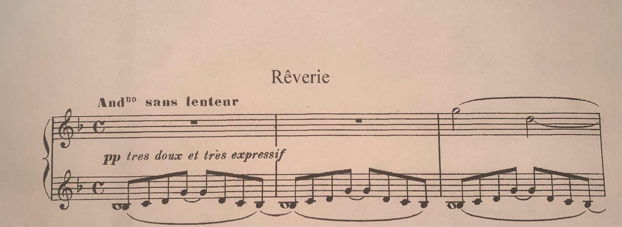 The first three measures of the song, the first two of which require only the left hand.