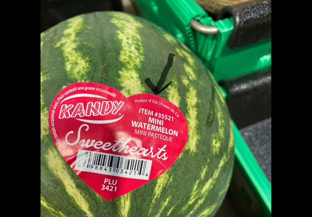 Label on watermelon says "product of USA".