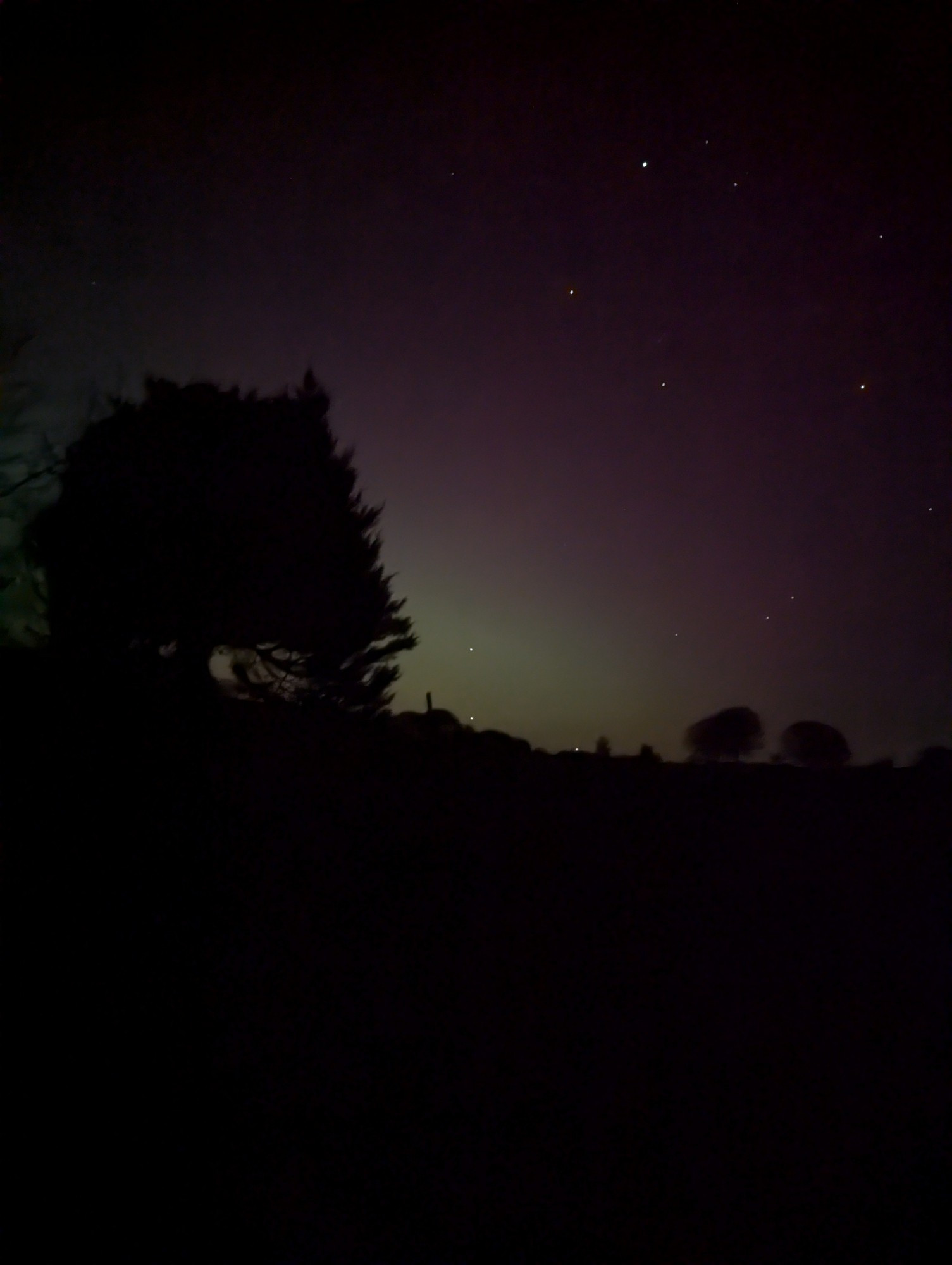 Aurora and stars in the night sky