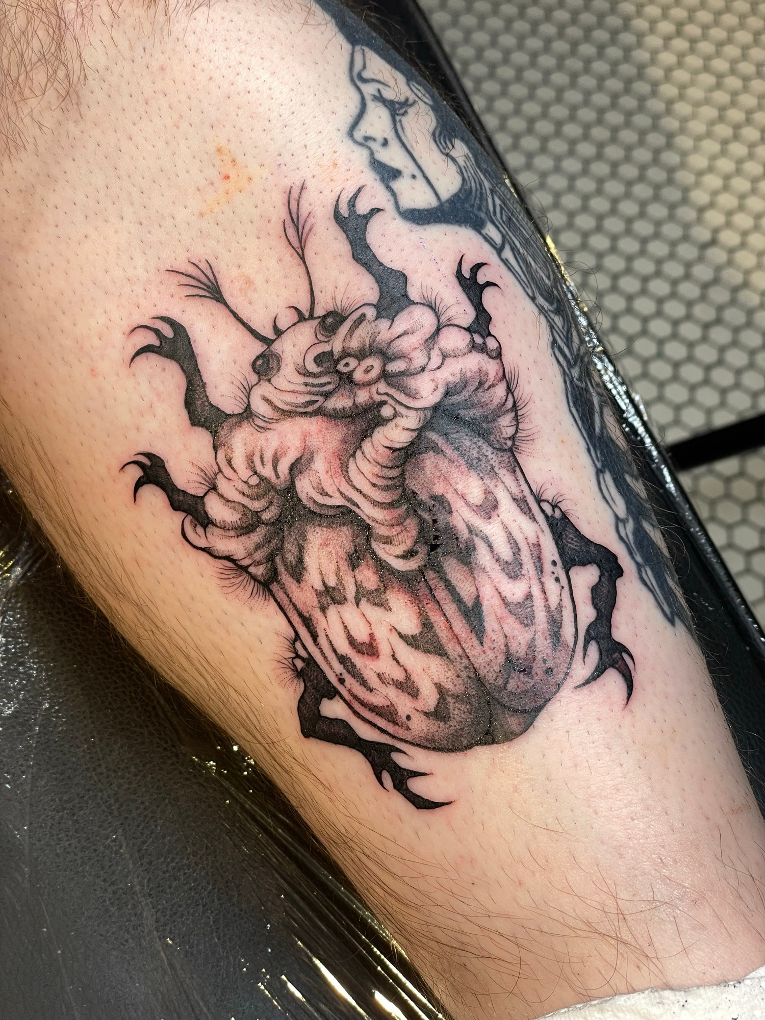 Blackwork bug tattoo