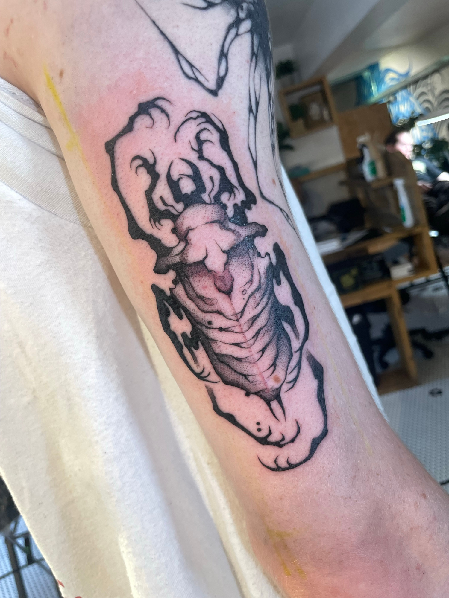 Blackwork bug tattoo